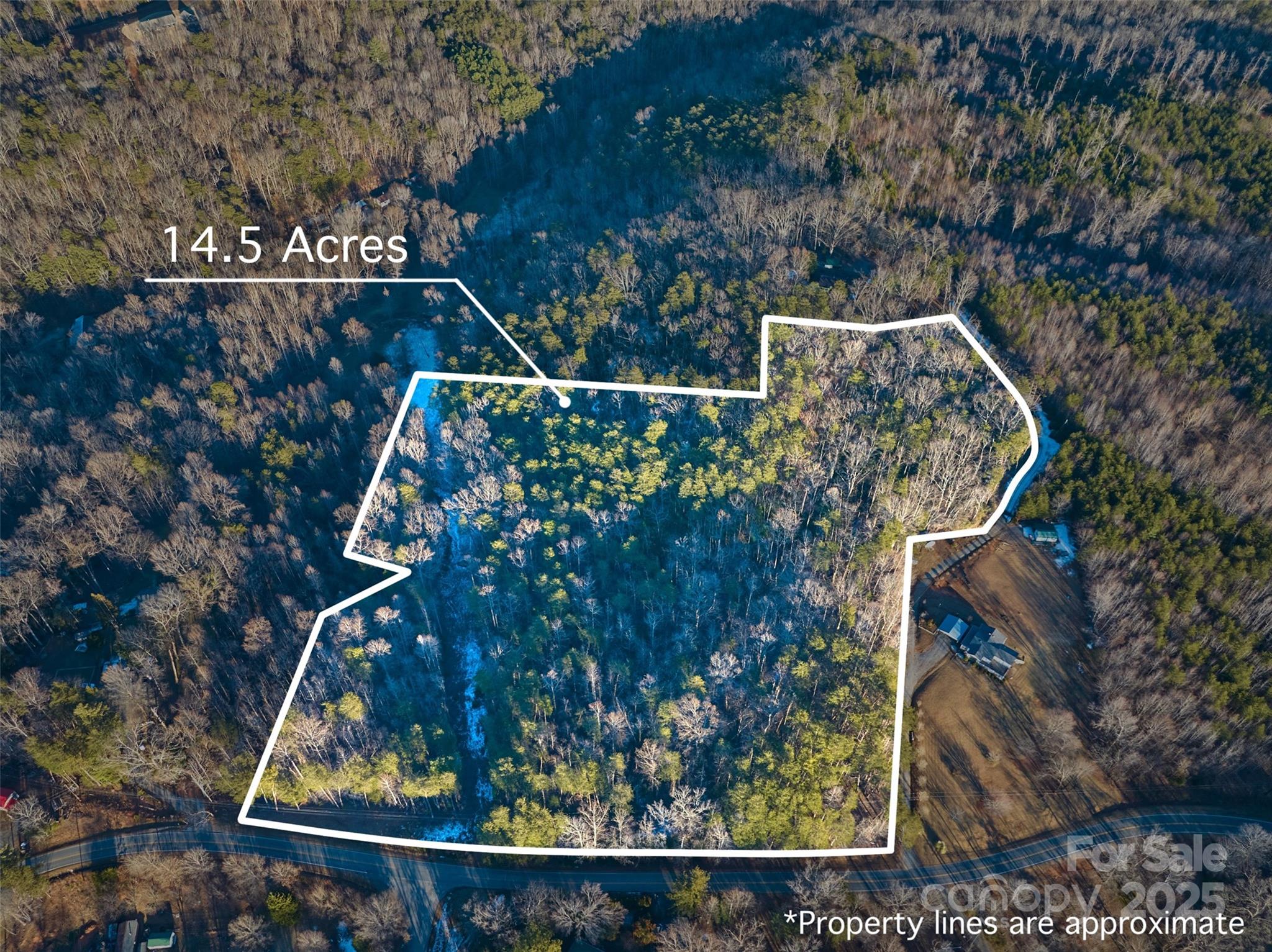 On the hunt for unrestricted acreage in the heart of NC horse country? Check out this 14.5 acre parcel lying off Hooker Rd, where location is everything! This wooded acreage has a gentle lying terrain with Mixed Use zoning allowing for a multitude of possibilities. It's located off a state maintained road, offering convenience and access to electric utilities. Situated just minutes from the local hospital, two large world class equestrian centers, scenic hiking trails, and mesmerizing waterfalls, this property provides the perfect blend of seclusion and convenience. For those seeking a balance between outdoor adventure and proximity to amenities and larger cities and airports, this land is the ideal canvas to make your vision a reality.

5 min to hospital, 15 min to Tryon International Equestrian Center, 12 min to Foothills Equestrian, 30 min to Asheville Airport, 40 To Greenville Spartanburg Airport

25 min to Hendersonville, 45 min to Asheville, 1 hour to Greenville