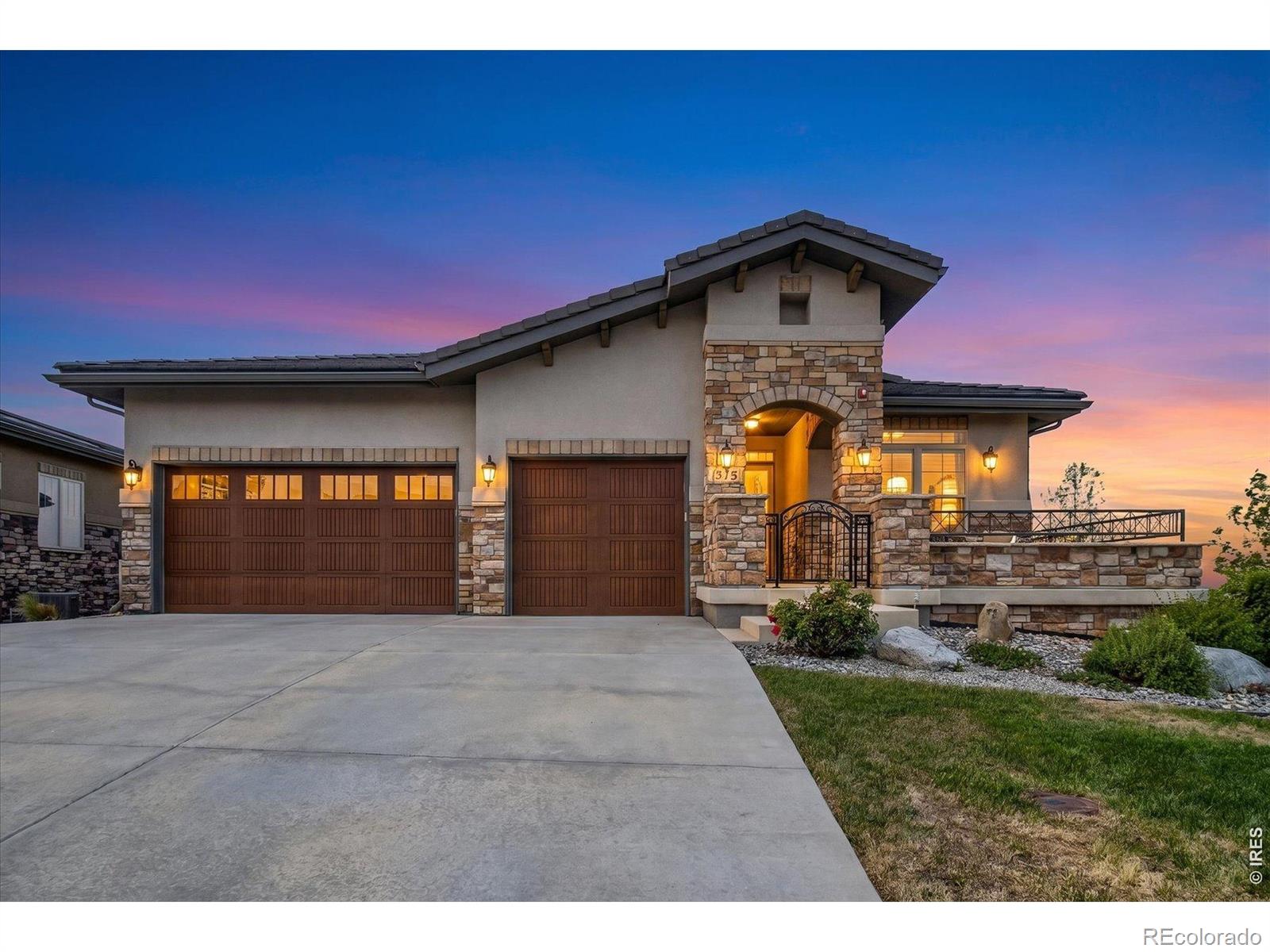 Luxury, lifestyle, and absolutely zero compromise. Welcome to Calmante, one of Superior's most coveted low-maintenance communities, designed for those who appreciate elevated one-level living without sacrificing style, space, or sophistication. Perfectly positioned on a premium corner lot with beautiful mountain views and open space surroundings, this impeccably maintained ranch-style home was lovingly cared for by its original owners and thoughtfully upgraded throughout. From the moment you enter, you'll notice the difference: rich hardwood floors, abundant natural light, plantation shutters, soaring open spaces, and a floor plan that simply lives beautifully.The kitchen is an entertainer's dream with a full Viking appliance package, six-burner gas range, double ovens, microwave drawer, wine refrigerator, ice maker, two paneled dishwashers, expansive granite island, walk-in pantry, and butler's bar area designed for effortless hosting.The open-concept design seamlessly connects the kitchen, dining, and family room, where a stacked stone fireplace and expansive windows frame the stunning Colorado backdrop. Step outside to the oversized covered deck and enjoy mountain views, open space, and peaceful trail surroundings that make this community so special.The main-floor primary suite offers the kind of everyday luxury buyers are searching for: abundant light, spa-inspired five-piece bath, oversized soaking tub, large walk-in shower with full glass enclosure, dual vanities, private water closet, and generous walk-in closet. A secondary main-floor ensuite provides ideal flexibility for guests or multigenerational living.Downstairs, the walkout basement expands the home beautifully with a massive recreation space, additional bedroom and oversized bath, plus exceptional storage.This is Colorado living for the buyer who wants elegance, ease, views, and impeccable condition - all just minutes from Boulder, Louisville, dining, shopping, trails, and Highway 36 access.