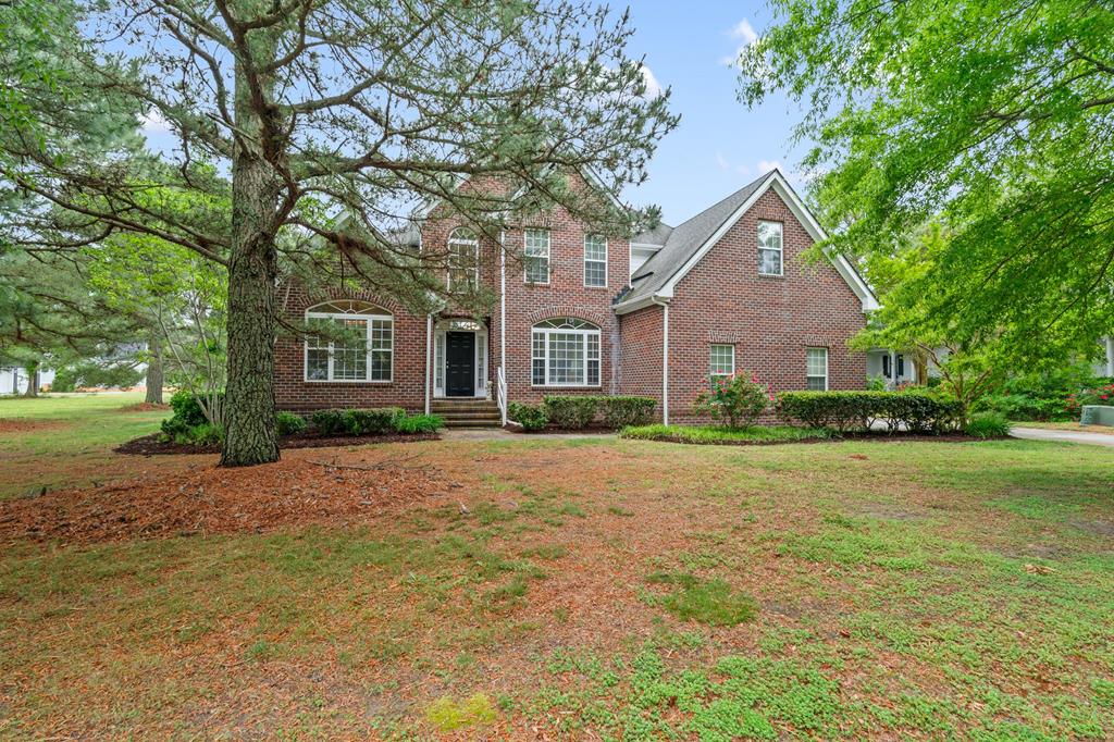 Spacious brick front coastal home at 507 Arnies Loop in Cape Charles, built in 2001 and offering over 3,680 sq ft of living space. Featuring 4 bedrooms and 2.5 baths, this property is full of potential for your personal vision and updates. Enjoy a nice-sized yard and abundant natural light streaming through large rear windows. Located in the beautiful coastal Bay Creek community, amenities include a private beach, pool, tennis courts, and scenic nature preserve with trails for hiking, biking and more. Opportunities like this will not last—schedule your tour today!
