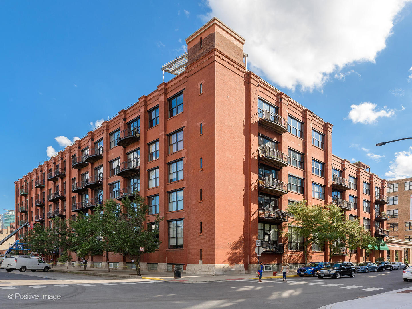 Nothing else like it. Perfectly positioned in the heart of the West Loop, this triplex loft with a private roof deck has been masterfully gut-rehabbed to deliver the ultimate blend of industrial character and sophisticated modern design. Bathed in natural light through oversized factory-style windows, the home showcases soaring 19-foot ceilings, exposed brick, and captivating skyline views.  Every inch of this residence has been thoughtfully reimagined, from the completely rebuilt chef's kitchen featuring expansive porcelain counters, custom cabinetry by Obrien Harris with walnut interior finishes and custom built coffee bar and pantry with professional grade appliances, to the spa-caliber bathrooms and custom-designed storage throughout. The primary suite features a spa like bathroom with custom warehouse windows that open to sweeping views of the city.    Crowning this loft is a spectacular private roof deck with panoramic skyline views, creating an extraordinary setting for outdoor dining, relaxation, and entertaining.  This full-service, pet-friendly building provides 24-hour door staff, on-site management, and the security of a prime garage parking space with additional storage, included in the offering. Surrounded by the dynamic energy of West Loop and Fulton Market-with its thriving venture capital and startup scene set alongside established Fortune 500 headquarters, world-class dining, and an ongoing wave of new development-this residence places you at the epicenter of one of Chicago's most vibrant and forward-looking neighborhoods.