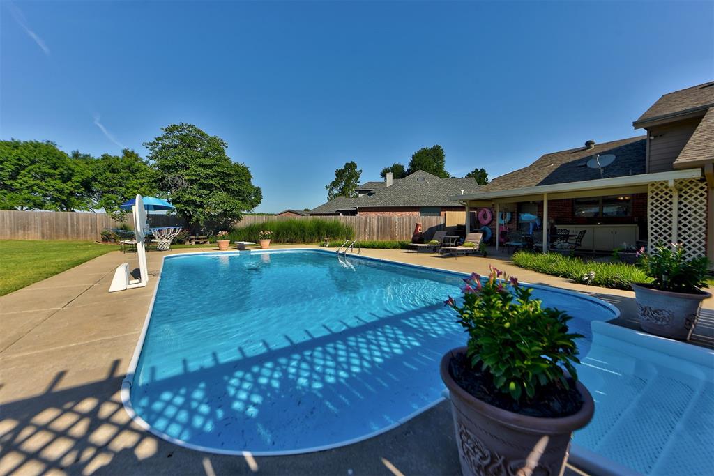 Come see this beautifully maintained home in the gated Crystal Lakes Addition. This community offers scenic walking trails, ponds, and neighborhood events making it perfect for your family. This 5 bed, 3 bath home sits on a half acre lot and features large living spaces, a gorgeous swimming pool, and an above ground storm shelter. Come check out the numerous upgrades in this home including new granite countertops in the kitchen, new hot water tank, new counters in the bathrooms, new roof coming soon, and too many other updates to list! See the last photo for a complete list of updates.