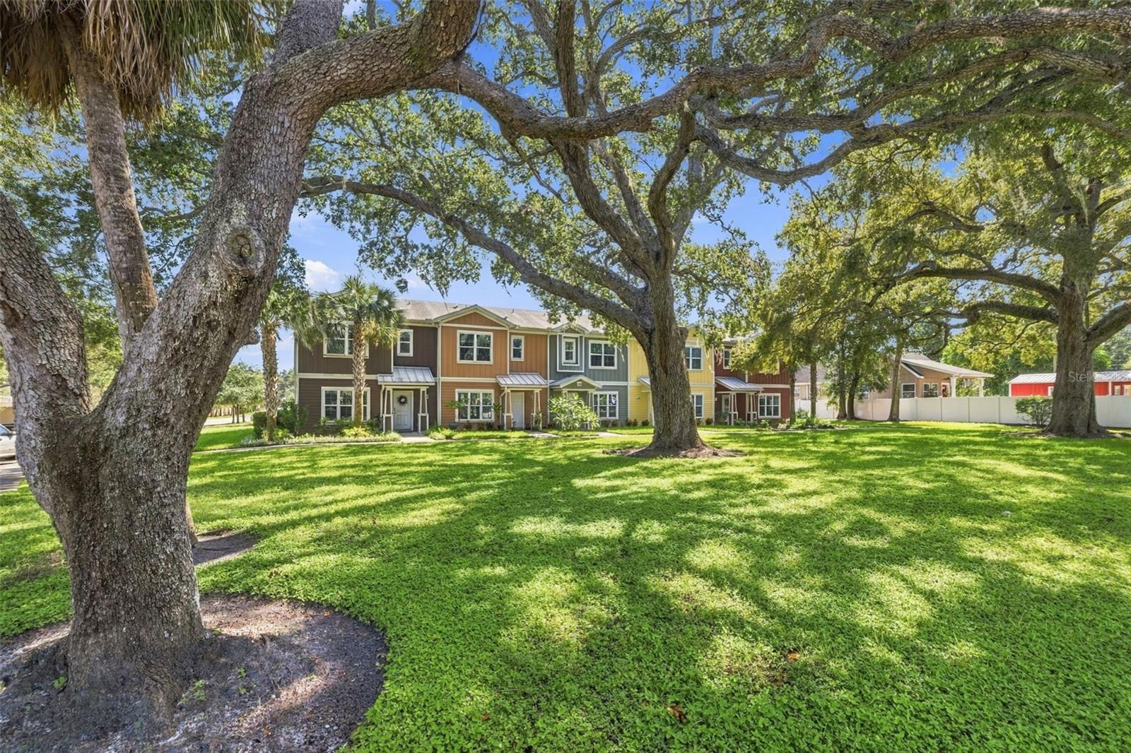 Morning coffee downtown, an afternoon walk on the Pinellas Trail, and sunset by the marina. Life in Dunedin has a way of making the everyday feel a little more special. A covered entryway welcomes you to this charming townhome built in 2017, where thoughtful modern updates and a private outdoor space make it easy to settle in. There’s peace of mind here with impact windows, a new A/C in 2024, and a roof maintained by the HOA. Fully paid-off, HOA owned solar panels add to the home’s energy-efficient features. Inside offers three bedrooms, two and a half baths, and a living and dining area that flows into a beautifully remodeled kitchen. Wood look tile runs throughout the main living space, while newer baseboards add a fresh, finished touch. The kitchen brings its own personality with sleek modern two toned custom cabinetry, quartz countertops, a solid glass backsplash, and decorative panel fronts on the refrigerator and dishwasher. An induction cooktop and convection oven make cooking simple for everything from a quick breakfast to a weekend dinner, with counter seating to keep the conversation close. A separate pantry cabinet and hidden wine storage give everyday essentials a place. Just off the main living space, the remodeled powder room is ready for guests with a sleek vanity, quartz countertop, raised modern sink, and a new toilet, lighting, and fan. Upstairs, the primary bedroom features two closets and an ensuite bath with a double vanity and glass-enclosed walk-in shower. Two additional bedrooms offer space to make your own, and all three bedrooms have carpet and ceiling fans with lights. The laundry closet is conveniently located on the second floor, with the stackable washer and dryer included. Out back, a courtyard sits between the home and detached one car garage, creating a private spot for morning coffee, a few favorite plants, or dinner outside. Right off Dunedin’s Main Street, you’re close to the little things that make this town such a sought-after place to call home. A morning café stop can turn into an afternoon browsing local boutiques and galleries, and dinner with friends can lead to one more stop at a favorite craft brewery. The Pinellas Trail is close by and offers a reason to grab your bike and see where the day takes you, while the marina draws you toward the waterfront for an evening breeze and sunset over St. Joseph Sound. And when a beach day calls, Honeymoon Island gives you sandy shores and Gulf views to look forward to. It’s a location that makes getting out and enjoying Dunedin feel like a natural part of being home. Schedule your showing today!