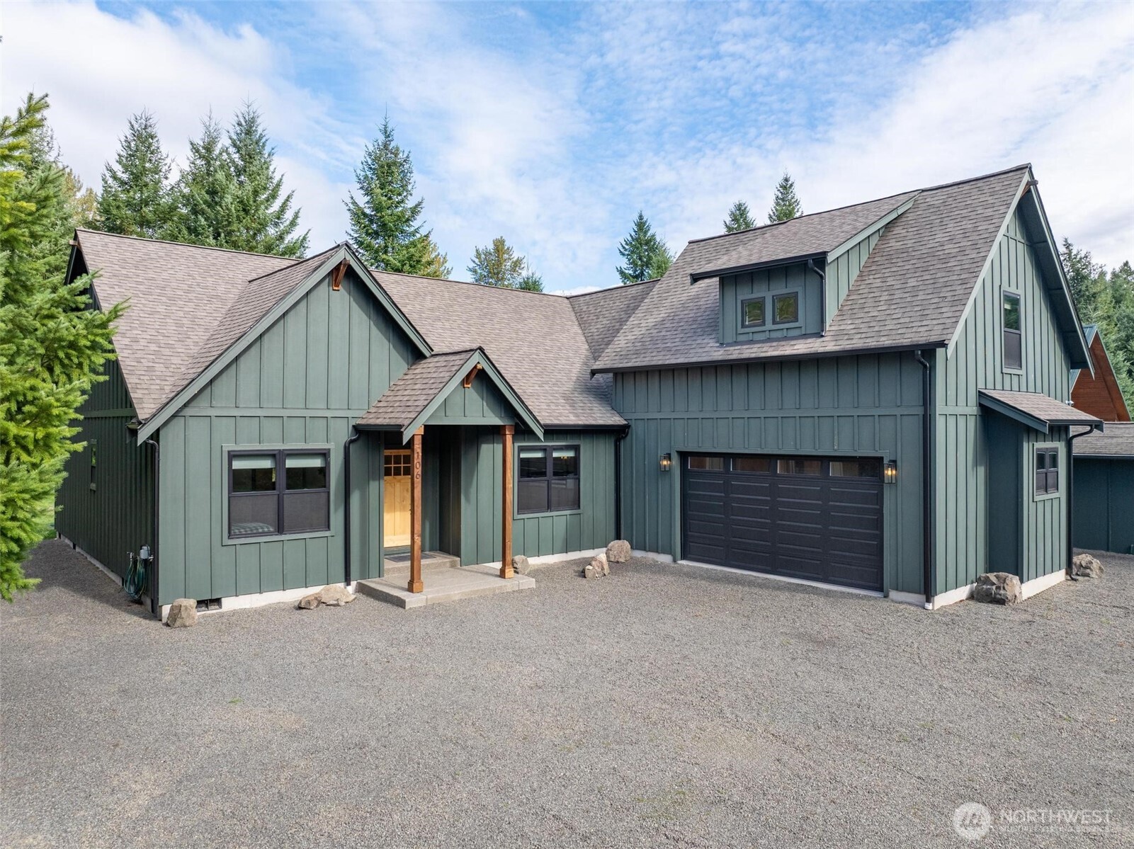 Welcome to this stunning 2021-built home nestled in the heart of Packwood. Boasting 4 bedrooms and bonus room above the 2-car garage, this home offers plenty of room for friends. The open-concept design is perfect for modern living, featuring a kitchen with a large island and ample space for entertaining. The great room features a custom tongue-and-groove ceiling and cozy gas fireplace, ideal for relaxing after a day of outdoor adventures. The luxury continues outdoors with a covered patio, hot tub and built-in fireplace, perfect for year-round enjoyment. Located less than 30 minutes from White Pass Ski Area, this property is a dream for skiing, hiking, and exploring the PNW. Perfect for year-round residence or mountain retreat!