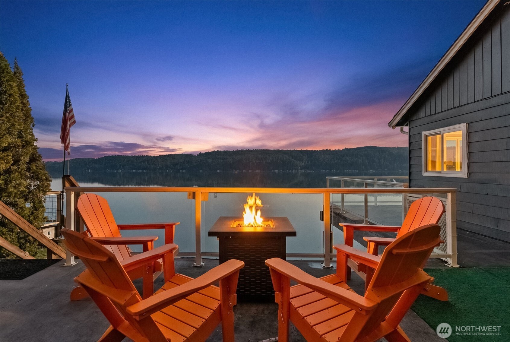 Welcome to the Hood Canal- the region's favorite waterfront retreat.  Enjoy single-level living on 70 feet of rare low-bank frontage, where the shoreline is just steps from your door. This fully remodeled cottage captures sparkling water views through expansive windows that frame the ever-changing tides.    The open-concept living area is light-filled and elegant, anchored by a cozy wood-burning fireplace. A beautifully refreshed kitchen offers modern appliances, clean lines, and effortless flow for everyday living and entertaining. Peaceful bedrooms and spa-inspired updated bathrooms create a comfortable, low-maintenance escape. Multiple-zone mini splits provide efficient year-round heating and cooling, and elegant furnishings make this home truly turnkey. (Fully furnished option available)    A private gated entry and dedicated parking add convenience and privacy. The expansive waterfront deck features a fire table, loungers, and BBQ -perfect for sunset gatherings. Kayak, swim, fish, or harvest oysters and clams from your own productive beach, or launch a boat just minutes away at the Belfair Boat Launch.    Currently operating as a successful short-term rental, this property offers lifestyle and income potential. Located near Alderbrook Resort & Spa, Wineries, and State parks. Easy commute to Seattle and just 20 minutes to the Bremerton Ferry.