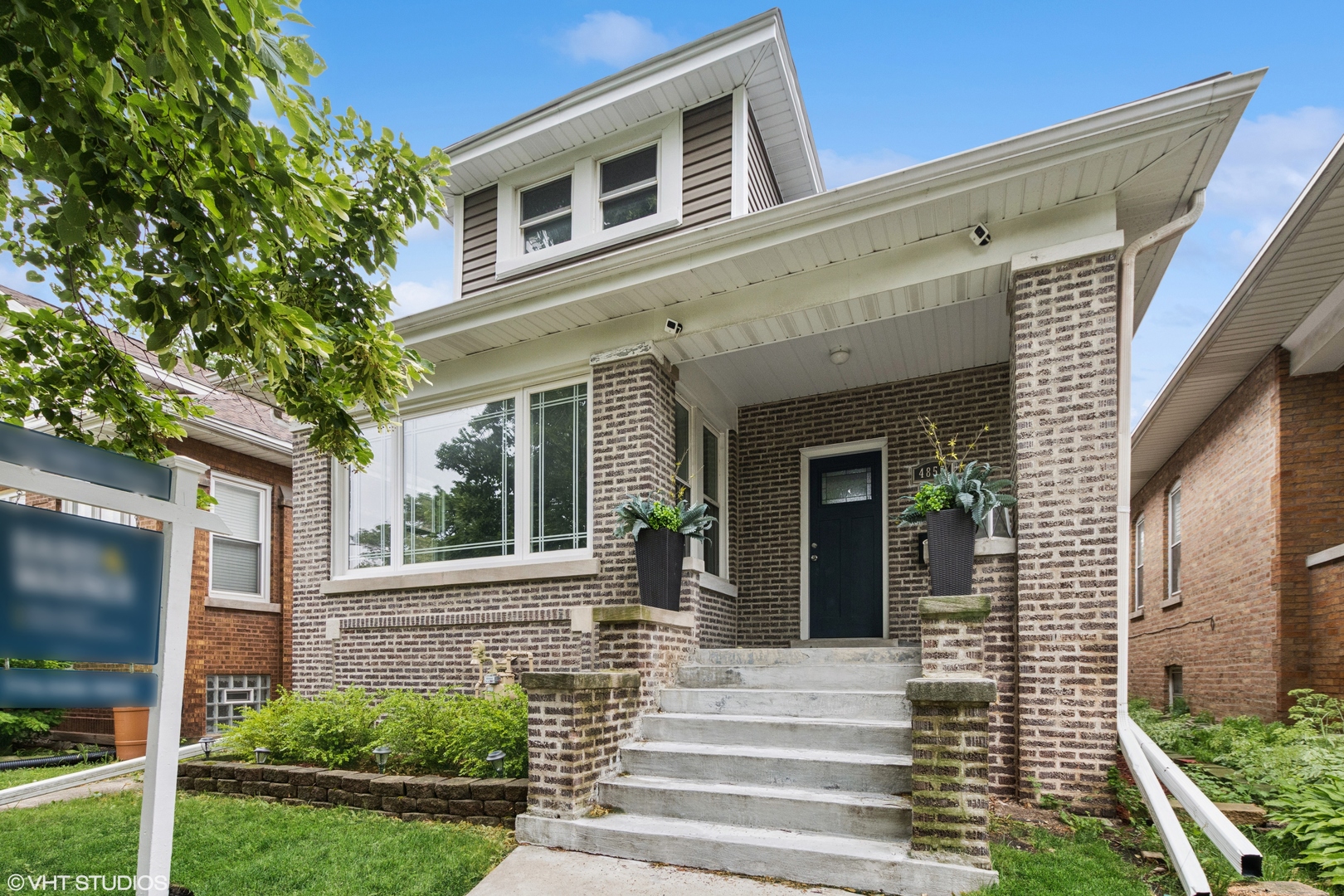 Welcome to your storybook brick bungalow, tucked into charming Mayfair and just a stroll away from leafy forest preserves and beloved John Palmer School. This 4-bedroom, 3-bath home has been beautifully reimagined with modern touches and sunny spaces. Oversized windows let the light pour into a sprawling living and dining area, with gleaming hardwood floors.  The heart of the home-an airy kitchen-features crisp white shaker cabinets, quartz countertops, an island perfect for gatherings, and even a wine cooler for toasting to good days. French doors open to a roomy deck and backyard, made for morning coffees or evening unwinding.  Upstairs, retreat to your dreamy primary suite with skylights, cozy new carpet, two walk-in closets, and a spa-inspired bath complete with soaking tub, separate shower, and double vanity.  The finished lower level offers even more flexibility, with a rec room, additional bedroom and bath, plus laundry. With newer roof, mechanicals, and updates throughout, all that's left is to move in and make it yours. Close to parks, transit, shops, and restaurants-everything you need, right where you want to be.