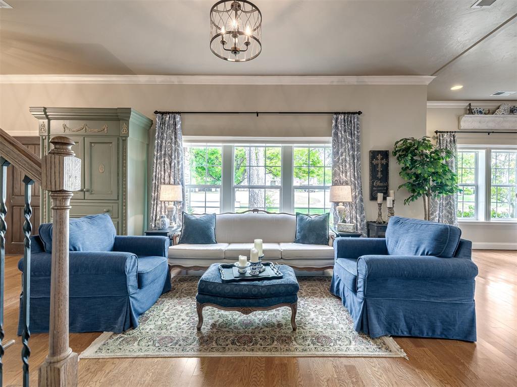 Some homes just have a presence — and 1228 Marlboro Lane is one of them.Built in 1947 in the heart of Nichols Hills, this home has been genuinely transformed over the years — not flipped, not patched — rebuilt with intention. The walls were raised to give you 10-foot ceilings downstairs. The kitchen was relocated and expanded. A butler's pantry was added. Hardwood floors nailed throughout. What you're walking into is a home that carries the character of its era with the bones of a serious renovation.Sitting on approximately a quarter-acre lot, the generous front setback and mature trees give this home a presence on the street that's rare — even for Nichols Hills.Two primary suites on the main level — each with their own private bath — is the kind of layout that sounds good on paper and feels even better in person. A third full bath rounds out the main level nicely.Natural light is everywhere in this home — large windows, thoughtful placement, and an open flow between spaces make it feel bright and alive at any time of day.The kitchen and living area open to each other with great natural light and a flow that actually works for how people live. Just beyond is the original living room — a second gathering space for quieter evenings, game days, or a little separation when life calls for it. The dining area was made for hosting.Upstairs adds a bedroom, full bath, loft, and extra storage — a great flex space for however you need it.Back on the main level, the walk-in pantry, indoor storm shelter, and attached garage check every practical box.The backyard is low maintenance by design — more time enjoying the neighborhood, less time in the yard.Just off Grand, you're close to parks, jogging trails, Trader Joe's, Whole Foods, great restaurants, and some of the best shopping in OKC.1228 Marlboro Lane is the kind of home that doesn't come around often — established, warm, and genuinely special.