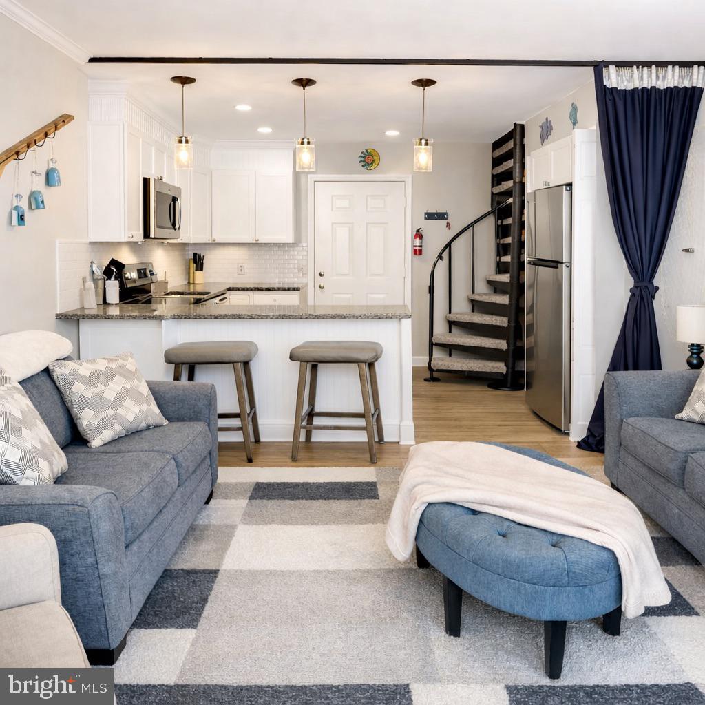 Welcome to your coastal getaway at Jockey Beach Club in North Ocean City! This beautifully renovated 1 bedroom, 1 bath condominium offers the ideal blend of comfort, location, and investment potential. Meticulously maintained and thoughtfully updated, this unit is move-in ready for your escape at the beach! Stainless Steel appliances accompanied by granite kitchen counter tops, along with PVC laminate flooring throughout the unit are just a few of the many upgrades in this split-level unit.  Located just 3 blocks from the beach, this sought-after building provides easy access to everything that makes Ocean City a premier destination. Whether you’re looking for a personal retreat or a strong-performing investment property, this condo delivers on both lifestyle and value. The unbeatable North Ocean City location places you close to shopping, dining, and entertainment, while also being just minutes from Northside Park and Recreation. This community friendly venue hosts numerous softball, baseball, lacrosse, and soccer tournaments, making the property especially attractive for seasonal visitors, athletes’ families, and short-term renters.  Don’t miss this opportunity to own a renovated, well-cared-for unit in one of Ocean City’s most convenient and desirable areas—perfect for beach lovers, investors, and anyone seeking a low-maintenance coastal escape.