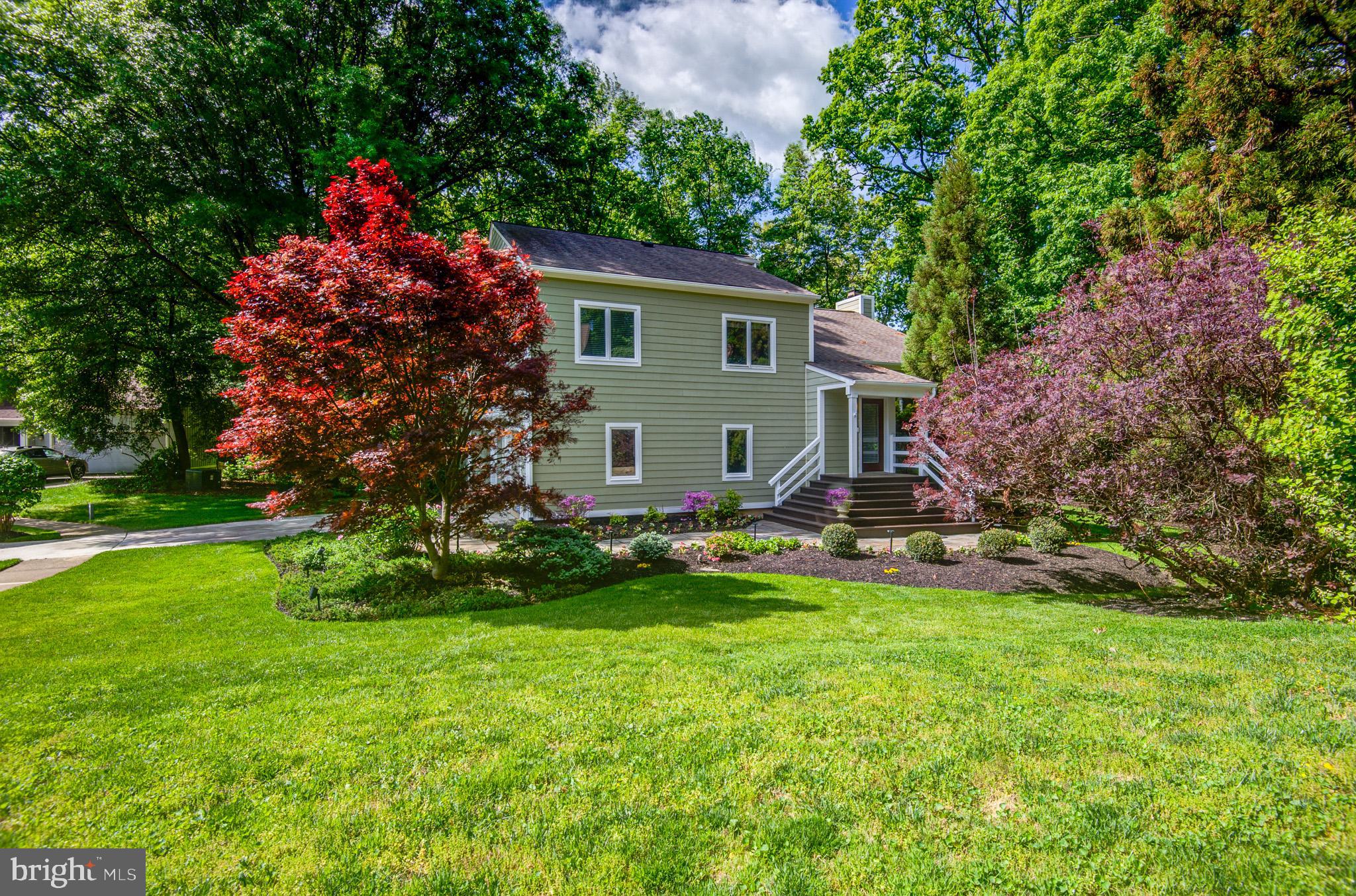 ELEGANCE NESTLED AMONG THE TREES ***ROBERT E SIMON INSPIRED***QUINTESSENTIAL RESTON BEAUTY***RARE FIND**At the heart of this breathtaking contemporary home is a spectacular custom-designed kitchen created for both elevated living and exceptional entertaining. Anchored by an extraordinary 11-foot center island, this space offers dramatic scale, stunning functionality, and a natural gathering place for family and guests alike.The visually captivating  kitchen offers endless custom Canadian Red Birch cabinetry providing abundant storage while seamlessly blending beauty and craftsmanship, all complemented by luxurious custom granite surfaces and designer finishes throughout.  The kitchen boasts  a 30-foot wall of windows that flood the home with natural light. Experience serene views of all 4 seasons while creating a custom culinary delight. Dining area for 10+ plus 5 more at the island!Primary bedroom offers custom designed ensuite bath featuring limestone shower, travertine tile, Restoration Hardware vanity and shower with two shower heads -overhead and hand-held. Two additional bedrooms on this level with a separate full bath. Brand new LG washer/dryer in the upstairs hallway.The family room has been thoughtfully updated with designer floor tiles. The gas fireplace is beautifully appointed with artisan tile work. This rooms features floor to ceiling windows leading to the spacious deck. Steps away from the deck you will be delighted to find a fire pit area giving you the feeling of being transported into nature.On this same level is the 4th bedroom or could be used as an office with exterior door. A full bath is adjacent to this room.The unfinished basement provides an abundance of storage and offers one of the two laundry areas.Your clients will undoubtedly fall in love with this home.