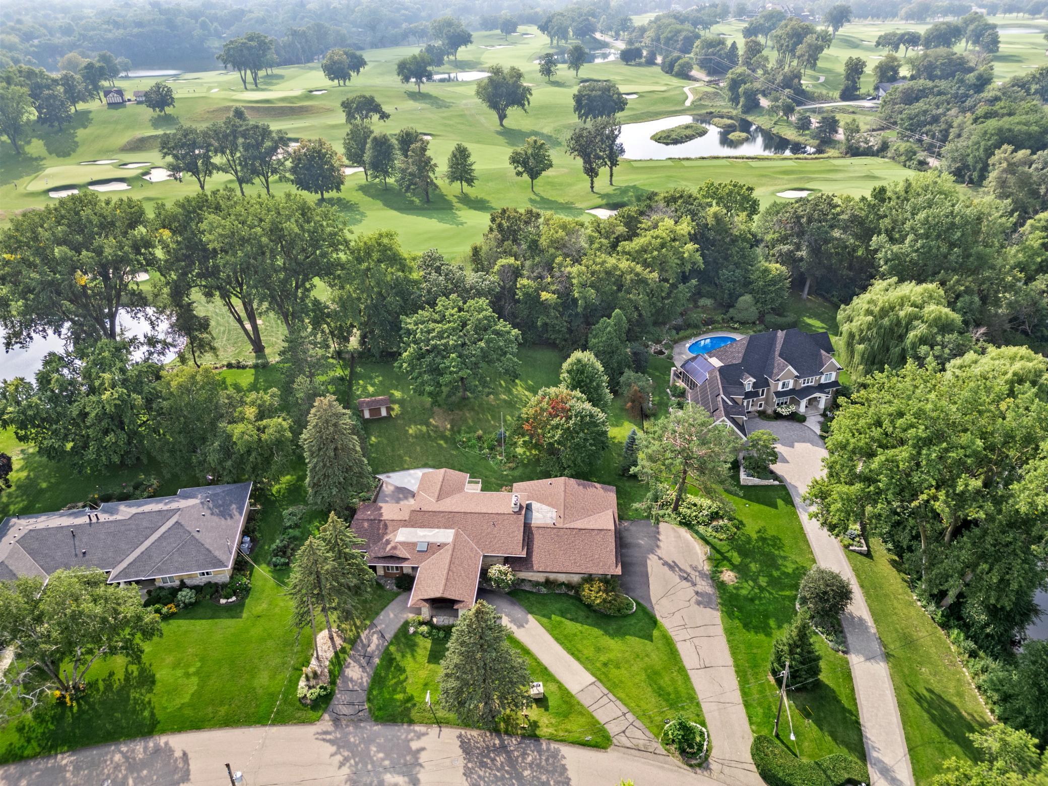 Seize a once-in-a-lifetime opportunity to create your dream home on this remarkable 0.89-acre lot, perfectly situated with views of the 15th hole at the prestigious Interlachen Golf Course. Design a custom residence tailored to your unique taste and preferences, with a builder renowned for superior craftsmanship, meticulous attention to detail, and an unmatched standard of excellence. This home will feature a variety of amenities such as a sports court, golf simulator, and a pool. Enjoy the serenity and luxury of this exclusive proximity to Interlachen Country Club, and other dining, shopping, and entertainment. Do not miss this chance to build your dream home on an exceptional lot!
