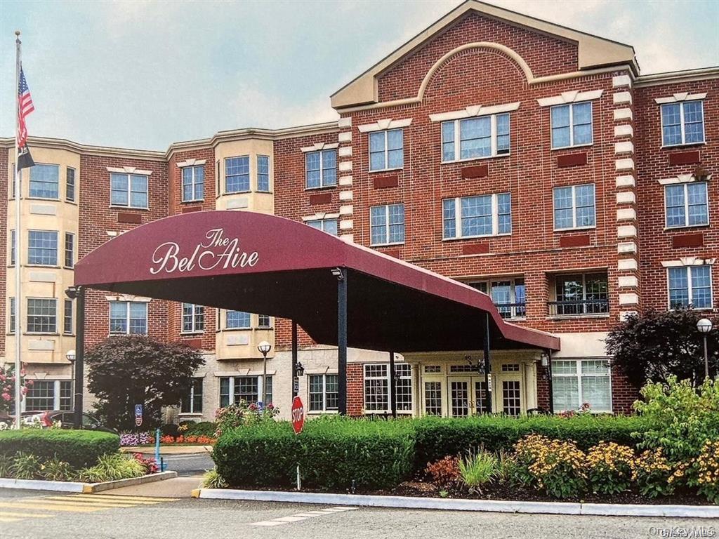 Enjoy beautiful fourth-floor views from this bright and inviting 2-bedroom, 2-full bath condominium. Featuring a spacious primary suite with a private bath, this well-maintained residence welcomes you with an attractive foyer, new laminate wood flooring, an open kitchen, and a comfortable living area filled with natural light. Additional features include an in-unit washer and dryer hookup and a thoughtfully designed layout that offers both functionality and comfort. Conveniently located near shopping, dining, transportation, and everyday amenities.