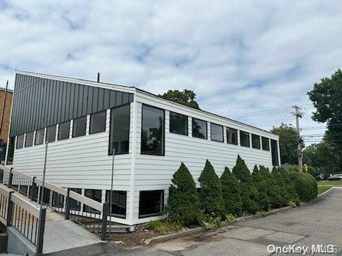 Renovated 2-Story Professional Building in the Heart of Huntington Suitable for Office or Medical Tenant. Suite is on the Ground Floor with 1,911 Square Feet with Waiting Room, Reception/Secretarial Area, ADA Compliant Half Bath, 8 Rooms, and Employee Half Bath. Rent is $6,688/Month Modified Gross Lease. Tenant to Pay $1.48/SF for CAM Charges and Their Proportionate Share of the Increase in Taxes. See Floor Plan for Lay-Out and Architectural Elevations. 54 Parking Spaces. Tenants Include a Neurologist, Physical Therapist, Mental Health Counselor and Electronics Company.