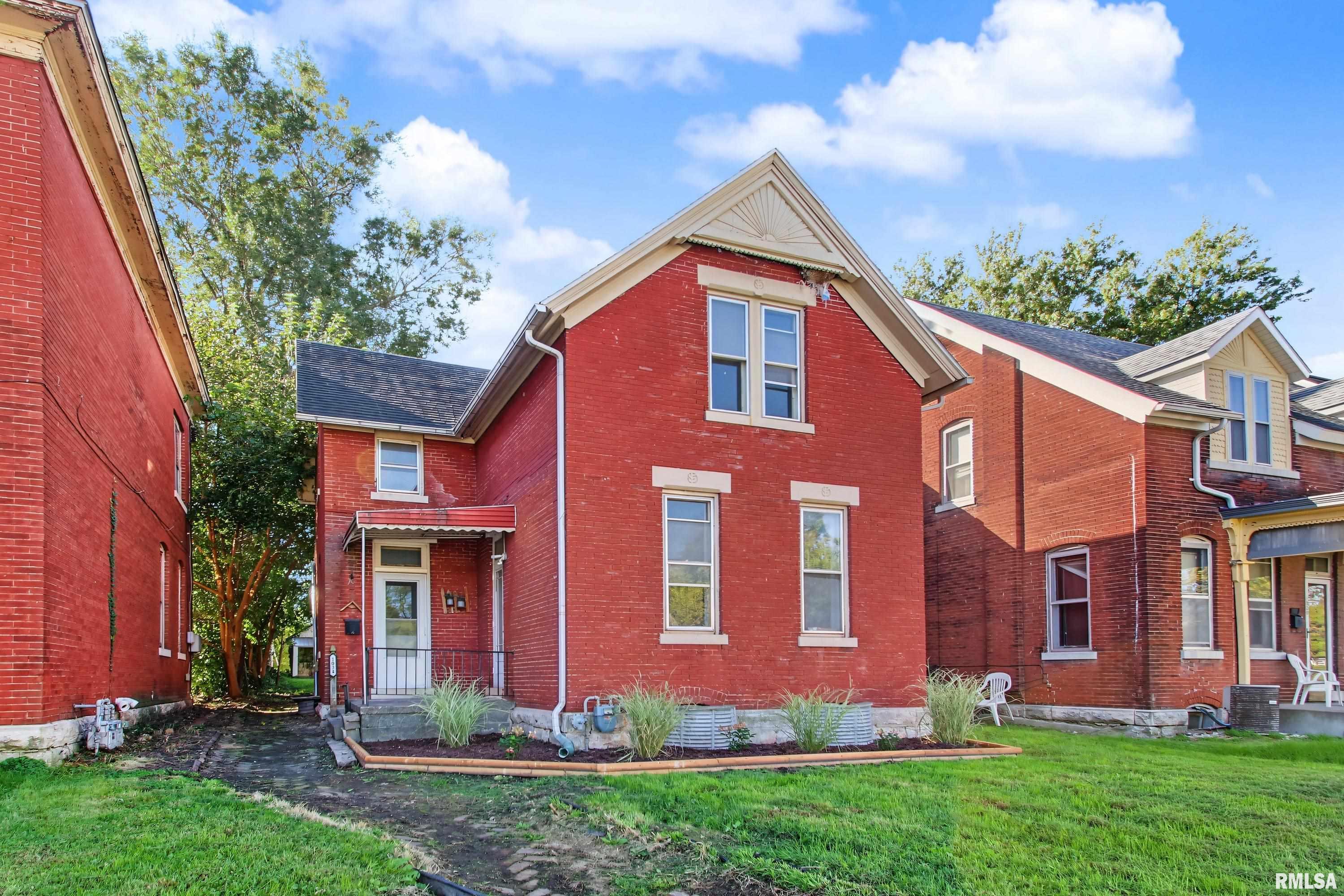 Space, character, and value, all wrapped up in solid brick story and a half home tucked into Quincy's south side "Calf Town" neighborhood. This 4 bedroom, 1 bath home offers nearly 1,700 sq ft of living space with room for everyone to spread out. You'll find oversized rooms with tall ceilings throughout, finished in newly installed luxury vinyl plank that looks great and takes almost no upkeep. The large kitchen has plenty of room to cook and gather, the bathroom has been updated, and a spacious mudroom keeps your hunting, camping, and outdoor gear organized and out of the way. A high efficiency furnace was installed within the last 5 years. Outside, a big yard and brick patio set the stage for cookouts and summer evenings, while the detached 2 car garage has room for vehicles, toys, and then some. A full unfinished basement adds even more storage. All of this sits close to some of Quincy's most beautiful parks and just a short walk from shopping and restaurants.