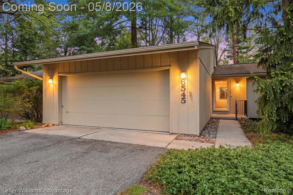 Welcome to 6545 Red Cedar Ln. This detached ranch-style condo offers a perfect private setting, tucked beside private Marion Lake with a truly unique up north feel.  Featuring 2 bedrooms and 2.5 baths, the home has a clean and open floor plan with great natural light and peaceful views overlooking the forest and the composite deck, perfect for indoor/outdoor entertaining.  The finished basement with a full bath adds excellent flexibility for extra living space, guests, hobbies, or a home office. The garage is one of the best you’ll find in any condo setting, complete with epoxy floors and built-in shop-style storage ideal for car enthusiasts, projects, or organized storage.  The HOA offers an extensive coverage list, including roofs, windows, doors, garage doors, and siding, making this a truly turnkey option for easy summer living.  BATVI