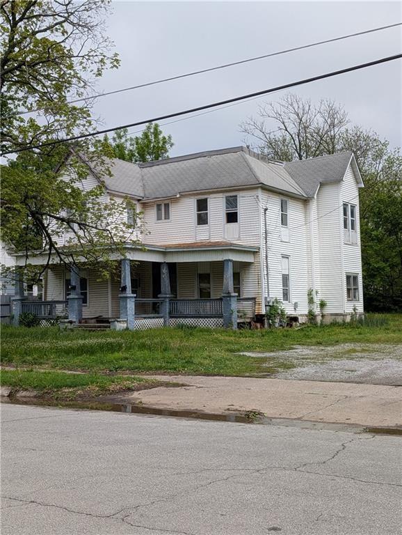 Located in the heart of historical area of Nevada MO & the hot spot for trick or treaters that walk down that street for treats. Bring your tool box or a magic wand. This property is being sold "AS IS". This property was a rental that was converted into a duplex two family home with one bedroom upstairs on each side. This property allows you multiple options from the zoning & price. This price would allow you the opportunity to fix it up or tear it down & build a new home. The lot is worth the price. This home was once used for a hospital & a nursing home. Here's your chance to show off your talents & give this spot a new life! Get started today! The previous owner started working on the property so the flooring is out & the house needs lots of work so be careful inside.