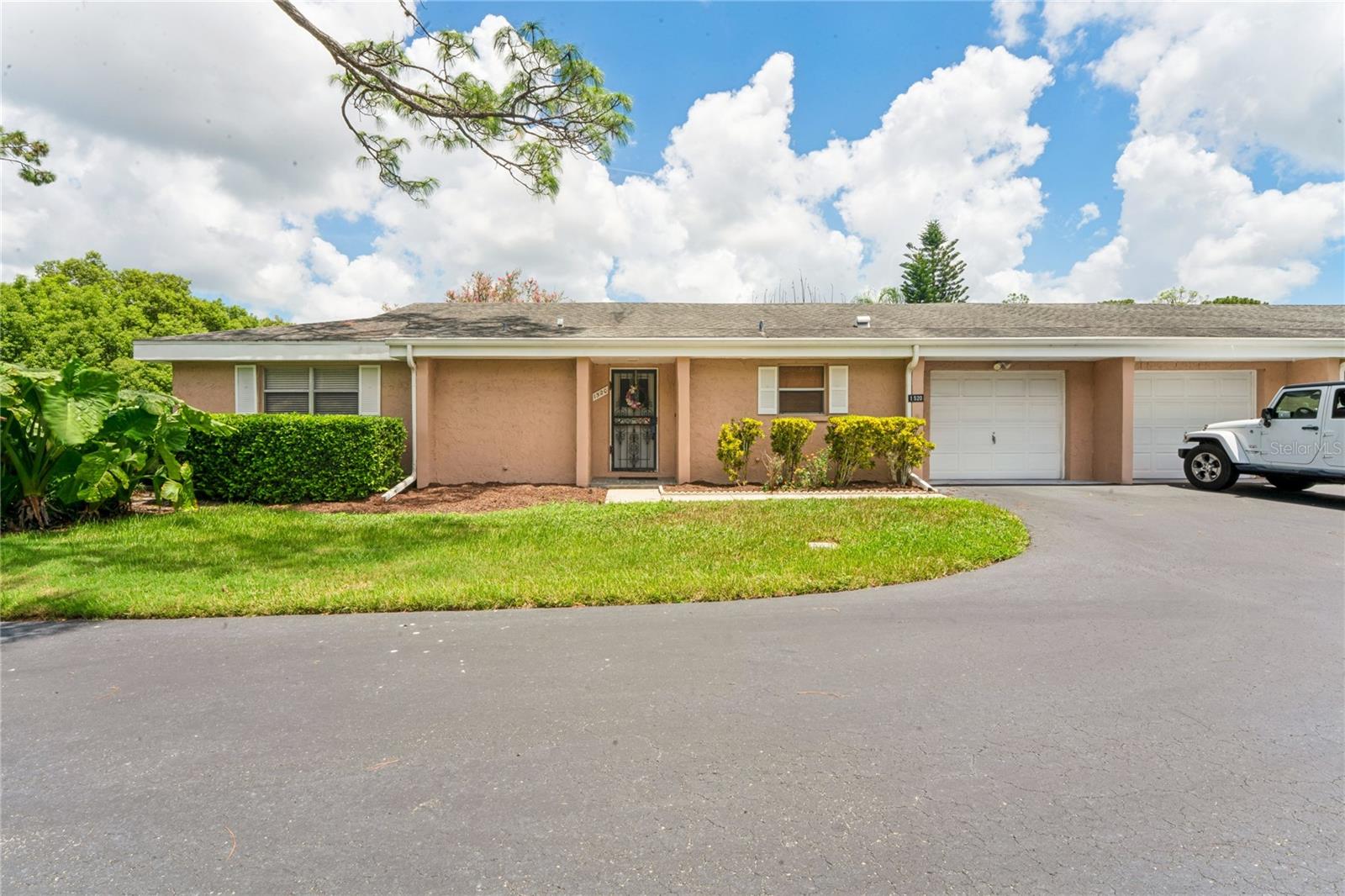 WELCOME HOME TO 1520 PALMER COURT! This beautifully updated villa offers the perfect blend of comfort, style, and easy Florida living in the desirable East Lake area of Palm Harbor. Step inside and you'll immediately appreciate the fresh, inviting feel and thoughtful updates throughout, creating a home that is truly move-in ready. Enjoy a spacious and comfortable floor plan designed for everyday living and entertaining, along with the convenience of low-maintenance villa living. Located in the desirable Tarpon Woods area, you'll enjoy a peaceful neighborhood setting while being just minutes from shopping, dining, golf, parks, recreation, and everyday conveniences. Location is everything, and this home delivers! Enjoy easy access to Lake Tarpon, John Chesnut Sr. Park, the Pinellas Trail, Tarpon Woods Golf Club, and the beautiful Gulf Coast. World-renowned Clearwater Beach is just a short drive away, offering beautiful white-sandy beaches, Breathtaking sunsets, dining, shopping, and endless waterfront activities. Also nearby is the famous Tarpon Springs Sponge Docks, where you can experience the area's unique Greek heritage, authentic restaurants, shopping, sightseeing, and historic sponge-diving culture.Whether you're looking for a full-time residence, a Florida retreat, or simply a beautiful home in a fantastic location, 1520 Palmer Court checks all the boxes. Updated, inviting, and ideally located—this is the Palm Harbor lifestyle you've been waiting for!