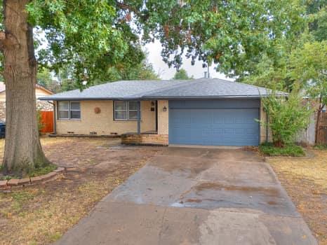 Cute and beautifully updated home ready for a new family! From the moment you arrive, the charming red front door offers a pop of color and charisma, creating a warm welcome and adding to the home’s curb appeal. Pretty flower beds with fresh mulch frame the entrance beautifully, just waiting for a gardener’s touch to make them bloom.
Step inside to discover a spacious, inviting layout featuring luxury vinyl plank flooring in the main living areas and new carpet in the primary bedroom. The kitchen is a true highlight — showcasing upgraded granite countertops, stainless steel appliances, a marble tile backsplash, and a corner sink that fills the space with natural light and lovely outdoor views. There’s ample counter space for baking and meal prep, plus a large dining room perfect for family gatherings.
Both bathrooms have been tastefully updated, and all bedrooms are nicely sized to provide comfort and flexibility. Outside, enjoy a pretty city lot with a beautiful, mature oak tree on a picturesque street — the perfect setting for this delightful, move-in-ready home that blends comfort, style, and charm.
