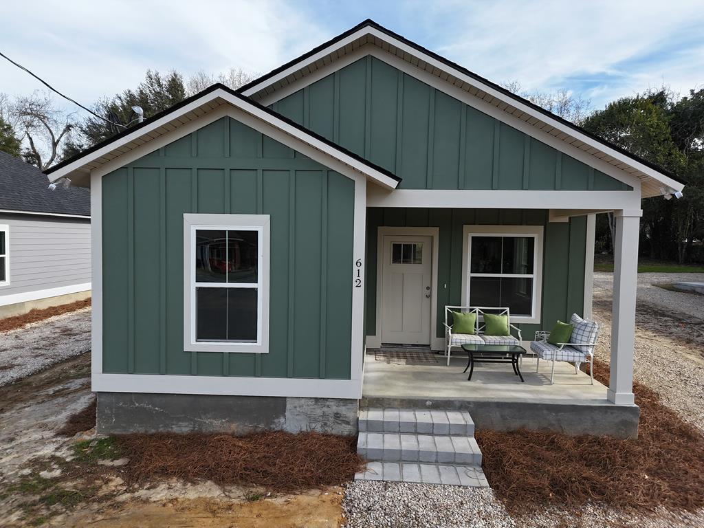 Welcome to 612 N Stevens Street, a newly constructed home offering modern comfort and thoughtful design in the heart of Thomasville. Set on a .25-acre lot  a generously sized yard for an in-town property.... This 3-bedroom, 2-bath home offers exceptional outdoor potential along with low-maintenance new construction living.  The open-concept layout creates a seamless flow between the living, dining, and kitchen areas, ideal for everyday living and entertaining. A split-bedroom floor plan provides added privacy, featuring a comfortable primary suite and two additional bedrooms.  Located a short distance to downtown Thomasville, this home offers convenient access to local shops, dining, and community events, while still being tucked into an established neighborhood. The spacious yard provides plenty of room for outdoor gatherings, gardening, play, or future enhancements.  An excellent opportunity for first-time homebuyers or local workforce families seeking quality new construction, a sizable yard, and an in-town location. For a virtual tour, click here:  https://my.matterport.com/show/?m=4UJ4sSuDDnS&mls=1