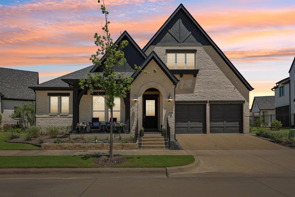 SOLD FOR $850,000 IN 2025. Sellers are relocating & their loss is your gain. Don't miss this Drees home on PREMIUM lot in 55-plus age-restricted Elements that is BETTER THAN NEW. Thoughtfully designed with style, comfort, and functionality in mind, this stunning home showcases soaring ceilings, an open-concept floor plan, and abundant natural light throughout. Chef-inspired kitchen featuring stone countertops, sleek cabinetry, premium appliances, a large center island, and generous workspace for cooking and entertaining. The kitchen flows seamlessly into the spacious living and dining areas, highlighted by a gas fireplace and views of the backyard. That continues to the FABULOUS OUTDOOR SPACE onto extended covered patio with screens, lighting create a space you’ll want to be in all year. The private primary suite offers a luxurious retreat with dual vanities, a freestanding soaking tub, oversized walk-in shower, and an impressive custom walk-in closet. A secondary independent suite with its own ensuite bath provides ideal accommodations for guests or dual owners. Additional living spaces include a dedicated media room, spacious flex space with dual walk-in storage closets that could be used as an office, a dry bar with custom cabinetry and wine storage, a well-appointed mudroom, and a tandem three-car garage with slat wall storage and an attic lift. Step outside your front door to a walking trail or community seating area and enjoy the lifestyle that makes Viridian one of Arlington's premier master-planned communities. Elements enjoys a dedicated pool, putting green, activity center and pickleball all within a 2 minute walk.  Also enjoy Viridian's Lake Club, Sailing Center, resort-style pools, tennis courts, miles of walking and jogging trails, and numerous parks. Conveniently located near shopping, dining, entertainment, and major commuter routes, this home offers an exceptional blend of luxury, convenience, and community living just 15 minutes from DFW Airport.