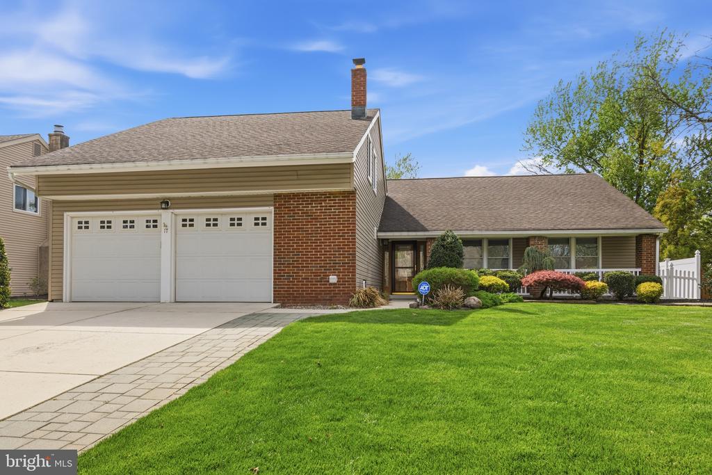 Welcome home to this immaculate 4-bedroom, 3 full bathroom residence in sought-after Marlton! Thoughtfully updated throughout, this home features a beautiful updated kitchen with solid cherry wood soft-close cabinetry, granite countertops, a stainless steel farmhouse sink, and a full 4-piece stainless steel appliance package. All three full bathrooms have been tastefully upgraded with modern finishes. The main level offers three spacious bedrooms, including a primary suite with its own private full bath. Upstairs, you’ll find a fourth bedroom that serves as an additional suite—perfect for guests or extended living—with its own full bathroom. Designed for both everyday living and entertaining, the main floor includes a generous living room, dining room, and a bright, open family room with vaulted ceilings. A convenient laundry room is also located on the main level. Additional features include ceramic tile flooring and high-quality Pella windows throughout. Step outside to your own private oasis—a beautifully landscaped backyard with stunning hardscaping, patio, and walkways. The lush lawn is kept pristine with a full irrigation system, creating a peaceful, zen-like setting year-round. Don’t miss your opportunity to own this move-in-ready home—schedule your private tour today before it’s gone!