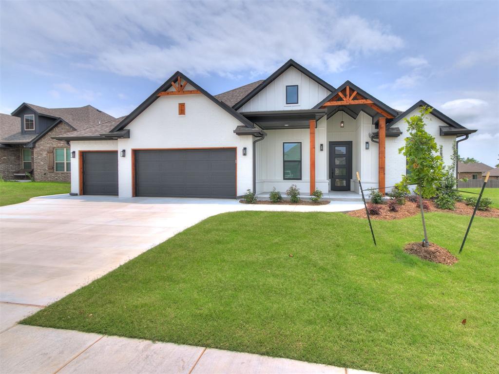 Welcome to this stunning new construction home in South Norman, perfectly positioned near OU and nestled beside a peaceful neighborhood pond stocked with fish. This thoughtfully designed 4-bedroom, 2 full bath, 1 half bath residence blends modern luxury with timeless finishes and an ideal, functional layout. The exterior makes a striking first impression with white painted brick, cedar beam accents, and a bold iron front door equipped with an electronic lock. Inside, soaring cathedral ceilings with stained wood beams create a grand yet inviting atmosphere, anchored by a dramatic floor-to-ceiling fireplace with a beautifully stained wood mantel. The kitchen is a true showpiece, featuring highly desired lower drawer cabinetry with custom hardware, quartz countertops, gold accents, a gas cooktop with pot filler, apron-front sink, and designer pendant lighting—offering both elegance and everyday functionality. Wood-look tile flows seamlessly through all high-traffic areas, combining durability with elevated design. Thoughtful details continue throughout the home, including a mud bench with hooks conveniently located off the garage entry, perfect for daily organization. The flexible front bedroom serves beautifully as a private office or guest space. The primary suite offers a true retreat with a tray ceiling and a spa-inspired bathroom featuring double door entry, elegant shiplap accents surrounding the tub, and a glass-less walk-in shower. The oversized walk-in closet is a standout, complete with floor-to-ceiling storage, a built-in dresser, and direct access to the laundry room for ultimate convenience. Two additional guest bedrooms are thoughtfully connected by a shared bathroom, creating a functional and comfortable layout for family or visitors.  With its prime South Norman location, upscale finishes, and serene pond-side setting, this home delivers a rare combination of craftsmanship, comfort, and convenience just minutes from campus, shopping, and dining.