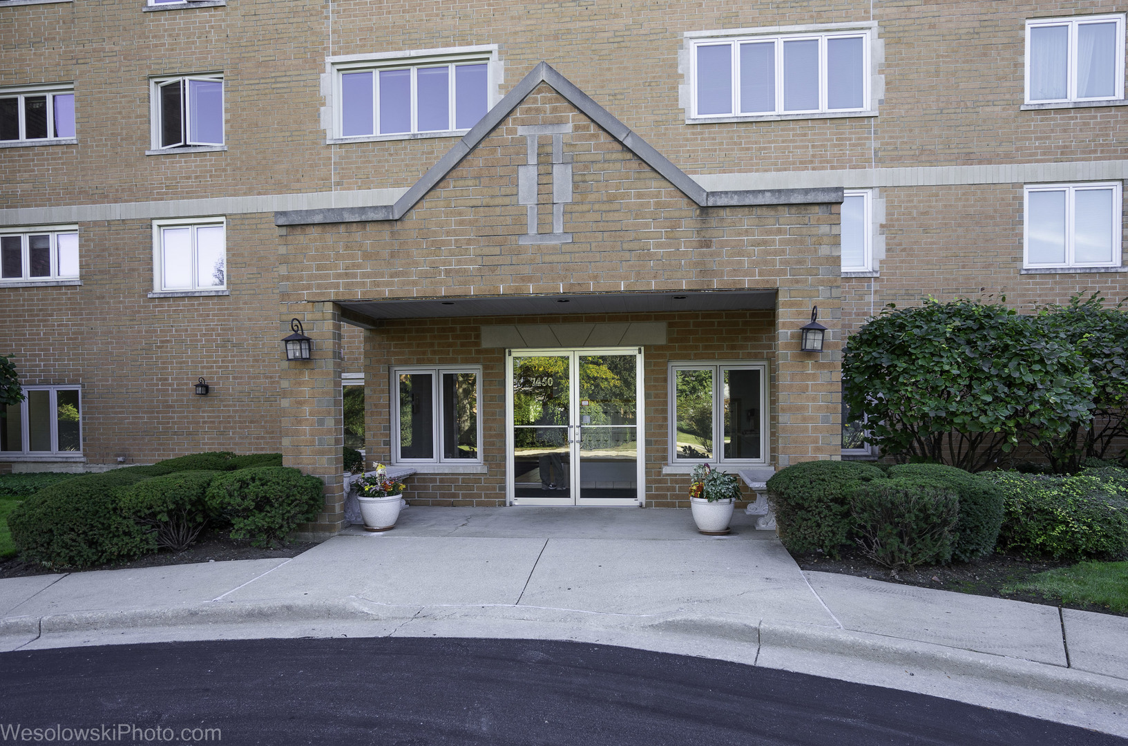Welcome to this sun-filled 2-bedroom, 1-bath condo nestled in the charming Abbey Manor community. Featuring hardwood floors throughout and a spacious eat-in kitchen, this home offers comfort and convenience in every corner. Enjoy in-unit laundry, a private balcony overlooking beautifully landscaped grounds- perfect for moorning coffee or evening relaxation. Added benefit of 1-car garage parking plus a dedicated storage unit.    This is an ESTATE SALE / AS/ IS -ideal for owner-occupants, as rentals are not permitted -Please note that the property is not FHA approved.