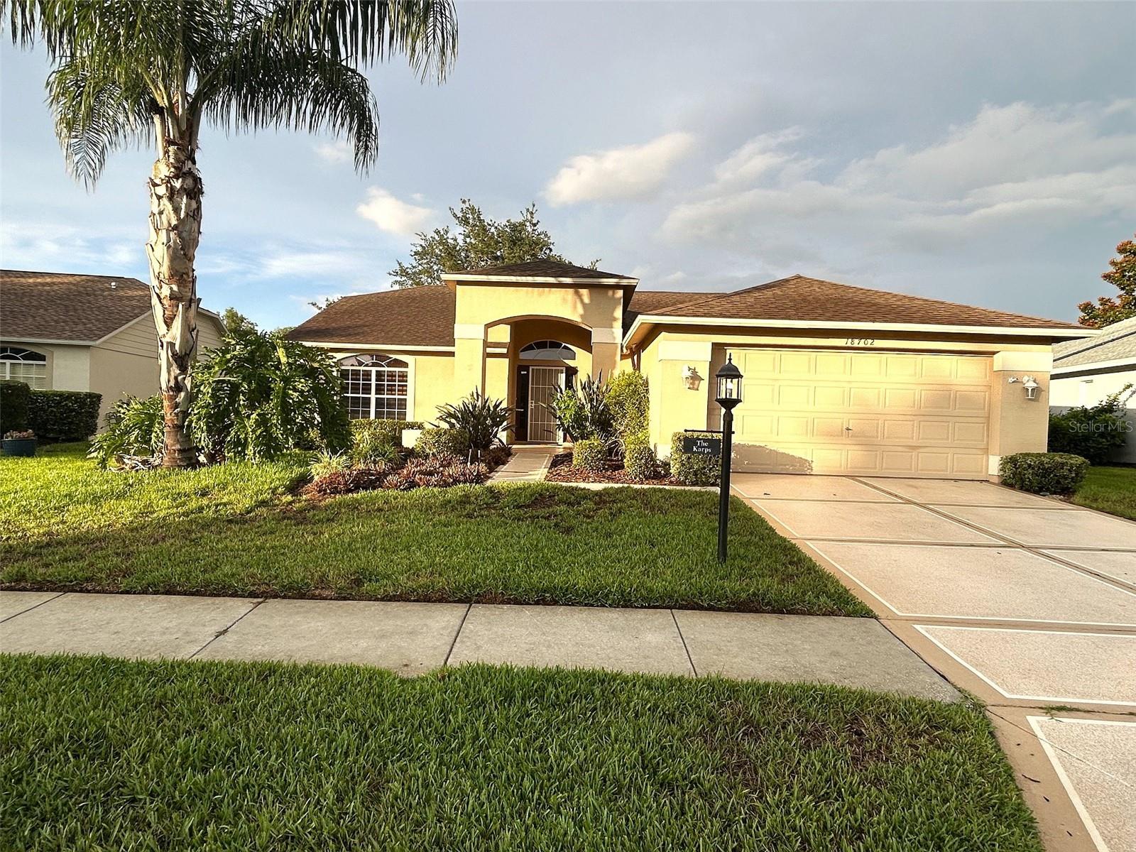 This Tamarack Model has a wonderful open floor plan. You are first met with a covered outside Patio and a generous Foyer just inside the front door. The open Living Room has a cathedral ceiling and flows into the Dining area. The open Kitchen is off to the left and complete with a Nook and a bay window. The stainless refrigerator has double doors with ice.  The main Bedroom has an ensuite bath with a walk-in shower and is located in the rear of the home and on the opposite side from the guest bedroom/bath. The home was remediated in 2013 and provides the securist of foundations (documents available upon request). Most windows have custom blinds as well as window treatments. The Laundry Room has an inside utility sink, pantry, and Kitty Door. The Driveway has a painted coating which complements the earth tones of the home. Heritage Pines offers the best in Dining and Entertainment with the Restaurant open most days of the week. There is an 18-hole private golf course, an Olympic-size swimming pool, Pickleball Courts, Lighted Har-Tru Tennis Courts, and Cards & Crafts for every interest. Heritage Pines offers a complete Lifestyle!