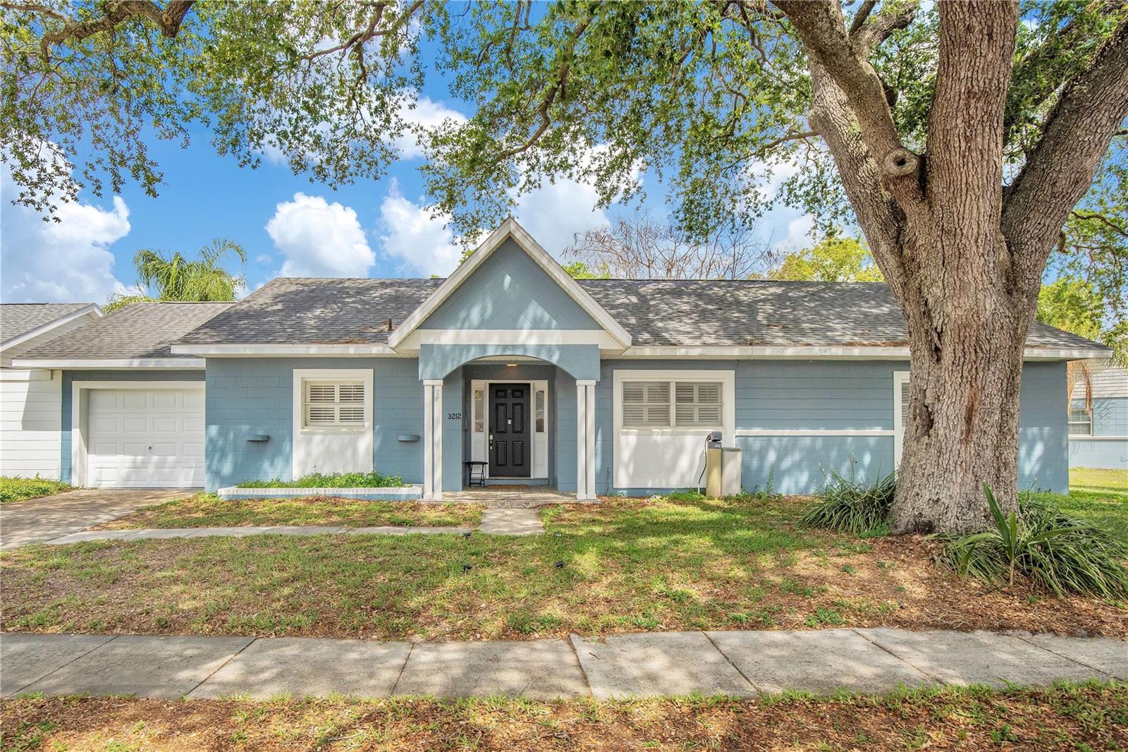 One or more photo(s) has been virtually staged. GREAT HOME IN THE ESTABLISHED VILLAGES OF SOUTHPORT — SOUTH ORLANDO GEM WITH VA ASSUMABLE MORTGAGE AT 2.75%! Beautiful landscaping and charming curb appeal welcome you to this move-in ready, open floor plan where YOU PICK YOUR OWN luxury vinyl floors from the exclusive Dyar Nasa Collection, making this home truly yours from day one! The centrally located kitchen is highlighted with white cabinets and a full complement of appliances that flow seamlessly into the dining and living areas. The FULLY REMODELED bathroom (2024) is your personal retreat, featuring porcelain tile, quartz countertops, soft-close cabinets, a rain shower with a tiled nook, and a roman tub providing a spa-inspired experience right at home. Soft close cabinets, quartz counters, porcelain tile, recessed lighting, ceiling fans, and decorative light fixtures provide the touches of elegance throughout this masterpiece. Walk out sliding glass doors to enjoy outdoor Florida living inside your screened enclosed lanai overlooking your large private fenced backyard oasis, perfect for summer BBQs and evening relaxation. Have peace of mind knowing this home features a ROOF REPLACED 2017, A/C REPLACED 2017, an enormous storm-safe walk-in closet with flexible use as a pantry or home office, ample hallway storage closets, and is PROTECTED with a 1-YEAR HOME WARRANTY! Best of all, take advantage of the RARE VA ASSUMABLE MORTGAGE AT ONLY 2.75% and save thousands on your monthly payment! Villages of Southport is a well-established community loaded with amenities, including a community pool, playground, and Southport Community Park plus partial lawn service.  Conveniently positioned just minutes from Orlando International Airport, the Amazon Fulfillment Center, and Lake Nona Medical City, with quick access to SR 528.  THIS IS A MUST-SEE!