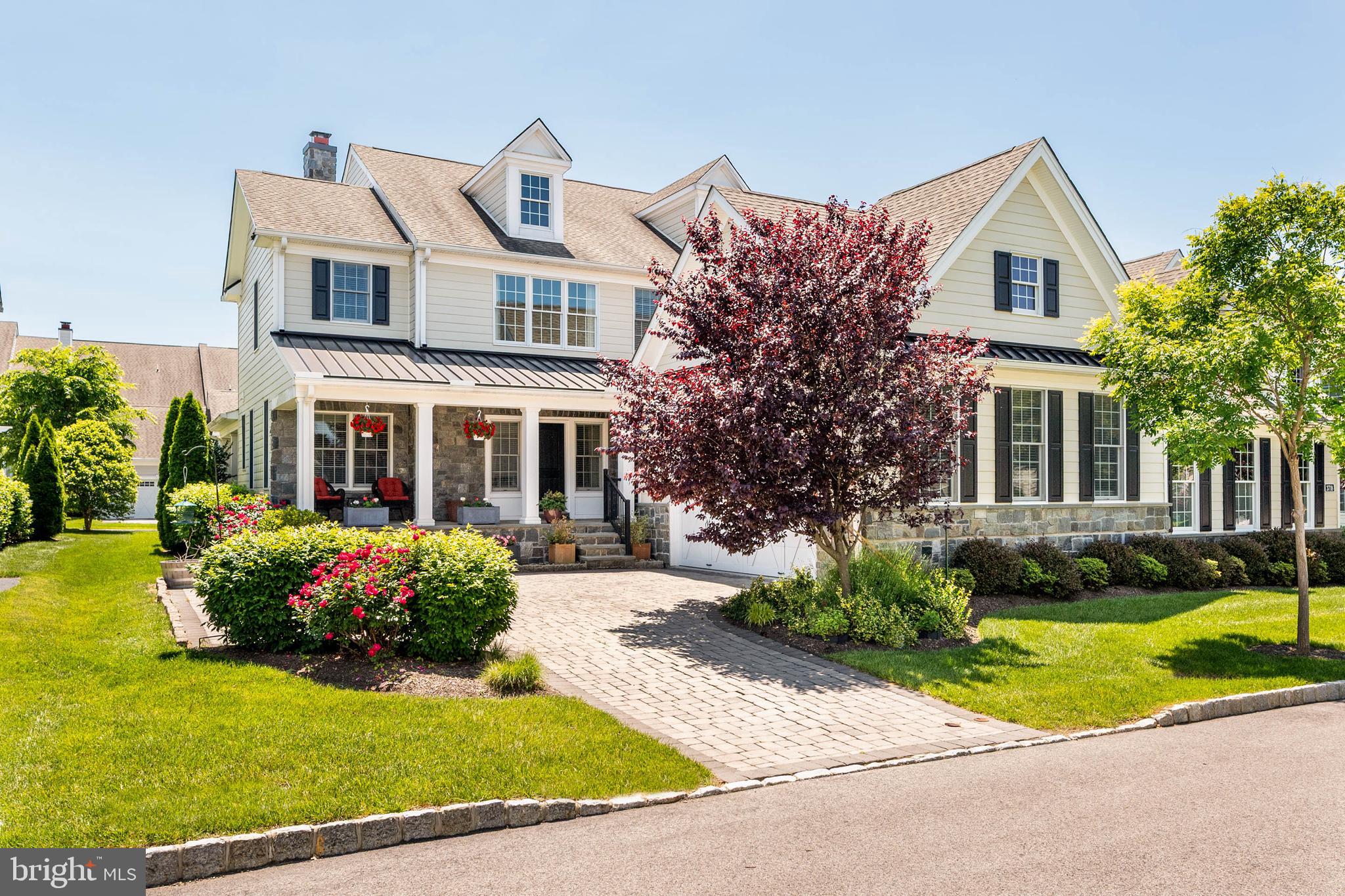 Welcome home to this highly desirable twin carriage home in the sought-after Liseter community of Newtown Square.  Step inside to an airy two-story foyer highlighted by a graceful, curved staircase with upgraded wrought-iron spindles and hardwood floors throughout. The open main level is thoughtfully designed for both everyday living and entertaining, featuring a private office, an elegant dining room with crown and chair rail moldings, and a dramatic family room with a gas fireplace and ceiling fan. This space flows seamlessly into the gourmet eat-in kitchen, complete with beautiful cabinetry, stainless steel appliances, quartz countertops, a spacious center island, and a dry bar just off the kitchen with a beverage refrigerator, perfect for entertaining. The separate pantry features custom shelving, offering both beauty and function. Just off the breakfast room, sliding doors lead to a Trex deck, the perfect spot for al fresco dining or relaxing outdoors. A powder room and attached garage complete the main level.The second floor offers three bedrooms and three full baths. The spacious primary suite features a walk-in closet with custom California Closets and a luxurious bath with a large frameless glass shower. Each additional bedroom includes its own private full bathroom and walk-in closet, providing comfort and privacy for family and guests alike. The finished basement is impressively large and includes a half bath, offering endless possibilities for recreation, a home gym, or additional living space. The extended two-car garage provides ample room for storage. Timeless exterior details include a charming bluestone side porch, a covered front porch, and the rear Trex deck—making entertaining a breeze. This home has been meticulously maintained and is truly immaculate.The Liseter community offers exceptional, country club–style amenities including a clubhouse with fitness center, tennis and pickleball courts, bocce ball, an infinity-edge pool, open-air pavilion, scenic walking trails, and a 6,000-square-foot award-winning barn for social gatherings. Ideally located next to the prestigious Episcopal Academy and just minutes from the vibrant towns of Wayne and Newtown Square, with Whole Foods and the popular shops and restaurants of Ellis Preserve nearby. All within the highly regarded Marple Newtown School District.