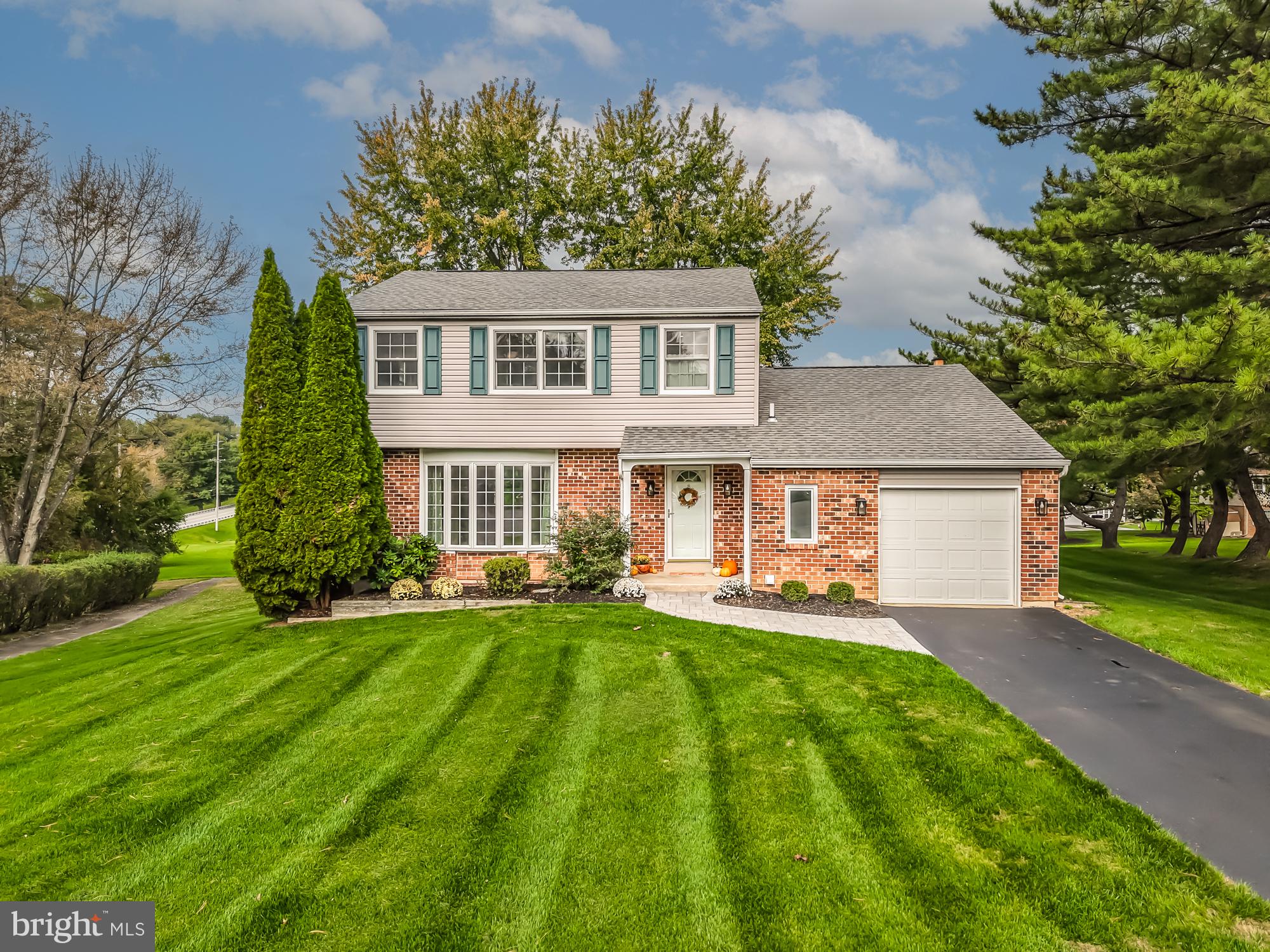 Welcome to this beautifully updated 4-bedroom, 2.5-bath Colonial, ideally situated on a quiet cul-de-sac on .31-acres. Offering a wonderful blend of comfort, versatility and style in an ideal community setting. The heart of the home is the inviting kitchen, thoughtfully opened to the family room, creating a wonderful flow for everyday living and entertaining. The family room features a beautiful brick fireplace and provides access to the deck overlooking the peaceful backyard. A walking path from the backyard leads directly to the community amenities, making it easy to enjoy all the neighborhood has to offer. Enjoy the swimming pool, basketball and tennis courts, playgrounds, fishing ponds, walking trails and clubhouse. For more formal occasions, the home offers a separate living room and dining room, with hardwood floors and recessed lighting, providing plenty of space for gatherings. A first-floor laundry and powder room adds everyday convenience. Upstairs you'll find four spacious bedrooms, including a generous primary suite with an ensuite bath. Pocket doors from the primary bedroom lead to an adjoining bedroom, creating a unique and versatile space that can be used as a dressing room, home office, exercise room, nursery, or private retreat. The partially finished basement offers space for a recreation room, home gym or hobby area. An oversized one-car garage provides plenty of room for parking and storage. Conveniently located near shopping, restaurants, entertainment & parks. Low taxes and a low HOA add to the appeal. Located in the award-winning Downingtown Area School District and highly regarded STEM Academy, this home is an exceptional opportunity. Truly move in condition with updated kitchen, baths, flooring, lighting and freshly painted.  As an added benefit, the buyer will receive a one-year America's Preferred Home Warranty, providing additional peace of mind. With its updated interior, spacious rooms, flexible primary suite, community amenities, and desirable location, this home offers the space, comfort and lifestyle you've been looking for. Come see all that this wonderful home has to offer!