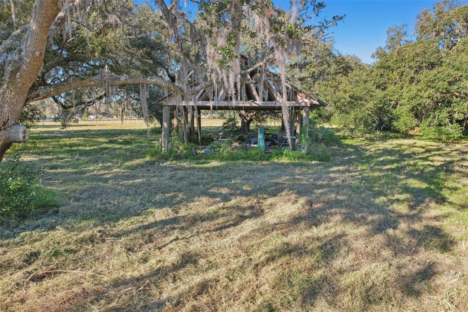 Under contract-accepting backup offers. This 7.6 acre plot was recently rezoned from residential/religious use to BPC-2 zoning. This plot is appropriate for investment, development, or 1031 exchange. The purpose of the BPC-2 (business park center-2) district is to provide areas for light-industrial activities. The BPC-2 district permits light manufacturing, fabrication, assembly, distribution and wholesaling activities, and some retail uses to support the businesses and activities within the Business Park Center. Other potential uses may include: farm worker dormitory (barrack style), planned development, transitional area development, off-site agricultural support, airport, intensive animal farm, wild or exotic animal breed, boarding or rehabilitation; commercial vehicle parking, communication towers, community centers, isolated convenience stores, cultural facility, general farming, financial institution (including drive-through), gas station, golf course, government facility, heavy machinery sales and service, heliports, helistops, hotels and motels, kennels and breeders, lime stabilization facility, livestock auction and sale, light manufacturing, non-phosphate mining, motor freight terminal, retail nurseries and greenhouses, offices, office parks, non-certified low and high power plants, printing and publishing, passive recreation, religious institution, research and development, retail, restaurants, schools, universities, self-storage facility, production studio, solar electric power generation facility, transit, utilities, vehicle recovery, vehicle auto body and repair, veterinary service, warehousing/distribution, and waterski school. Come take a look at this versatile commercial land investment. Land is raw, water is connected. Picture represents land when it was mowed. Seller requests no seller finance, subject to (subto), wholesale, or assignable offers. Statements and measurements are believed accurate by Seller/Agent, however they cannot be guaranteed. Buyer and Buyer's agent must confirm all statements and measurements for themselves. Adjoining land at 00 CR-542 is also available for sale. Plots can be combined.