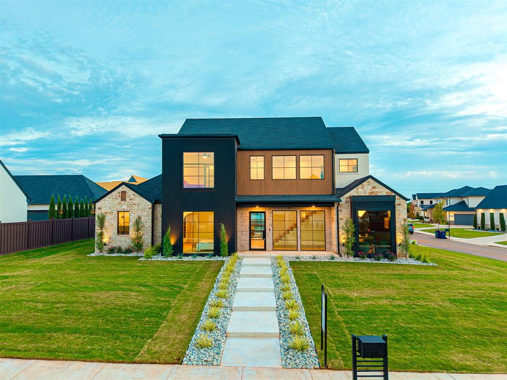 This award-winning Parade home in the Annecy Addition was honored with Best Overall Floor Plan and Best Outdoor Living, and it’s easy to see why. With a smart layout and luxury details, this home balances everyday comfort with spaces designed for entertaining.

The plan offers 4 bedrooms plus a study, with the primary suite and an additional guest bedroom with a full bath conveniently located on the main floor. Upstairs you’ll find two more bedrooms, along with a game room and a media room, creating plenty of options for family and guests.

The kitchen is a showpiece featuring a large walk-in pantry, a full-size refrigerator and freezer, and a double oven with a French-door upper unit. Thoughtful details carry into the serving area off the patio, complete with an ice maker and beverage refrigerator, making entertaining seamless.

The outdoor living space sets this home apart, with a flip-out serving window, motorized screens, and built-in patio heaters, creating a retreat you can enjoy year-round. The epoxy-coated garage floor with high ceilings is both stylish and functional, and is currently displayed with an optional car lift for enthusiasts.

Every detail of this home reflects a blend of award-winning design, modern features, and everyday livability, making it a standout in the Parade of Homes.