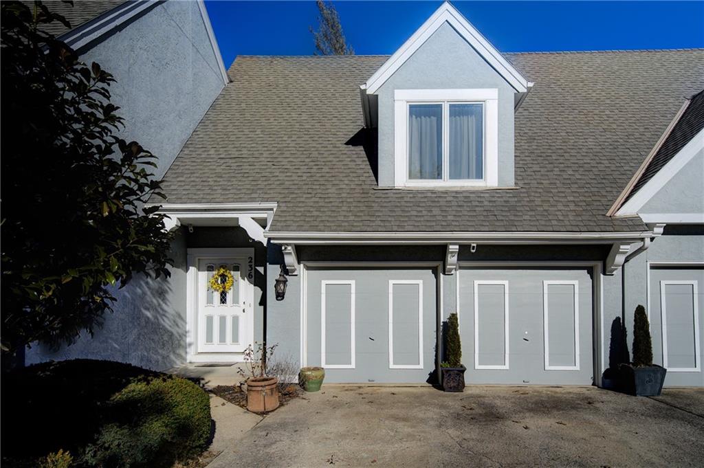 Maintenance-provided townhome with 2 bedrooms and 2.5 baths in Raintree Lake. The main level features a vaulted great room with a stone fireplace, kitchen with granite countertops and subway tile backsplash, and a formal dining area. Upstairs offers two bedrooms, each with a private bath, plus convenient hall laundry. Finished lower level includes a flexible rec room, half bath, and two finished storage areas. Two-car garage. Enjoy lake living with boating, fishing, water sports, miles of walking trails, a zero-entry pool, and an active community.