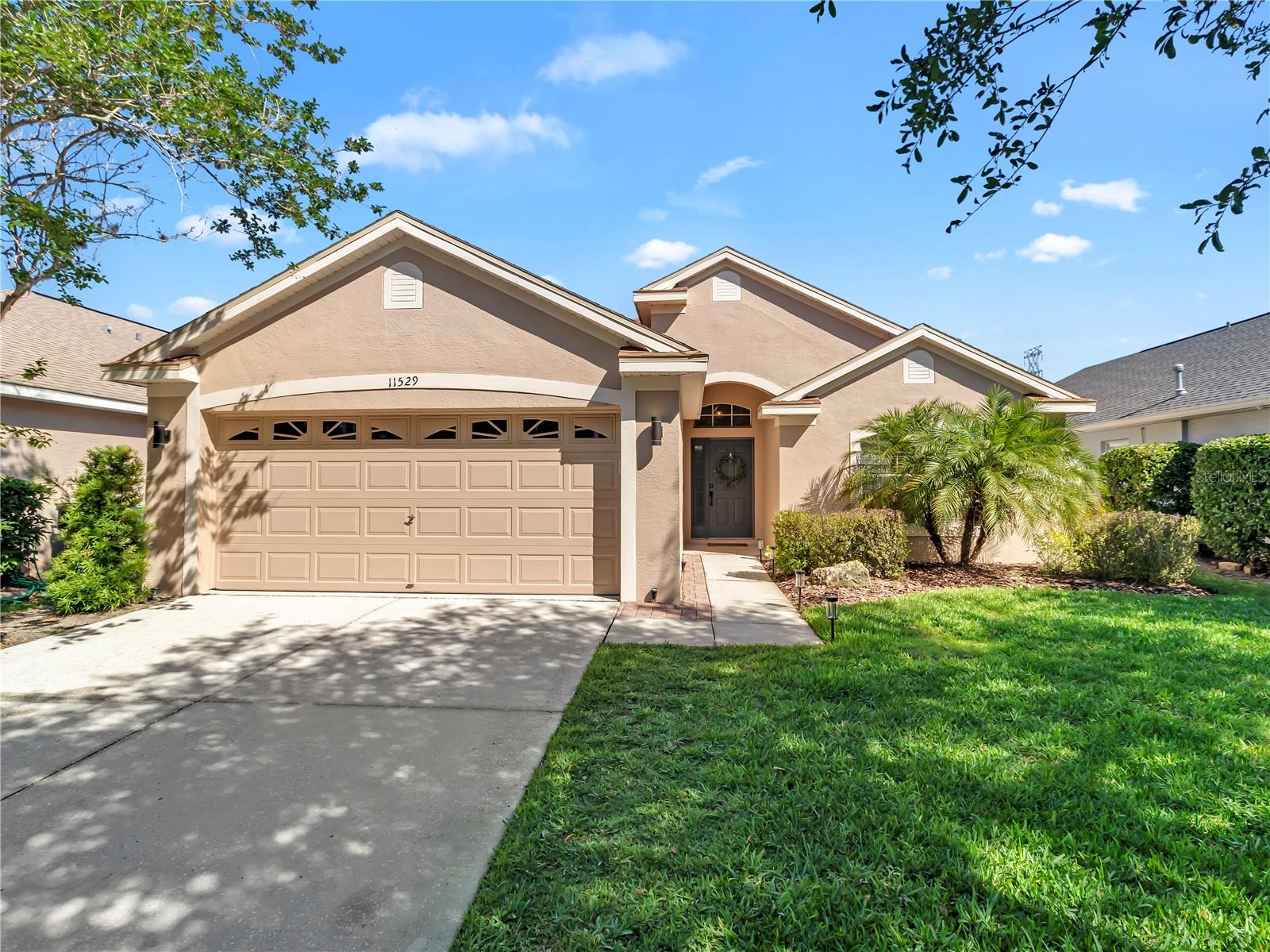 HONEY STOP THE CAR!!!  YOU WONT BELIEVE YOUR EYES!!!  Want NEW, but CAN'T wait for it to be built OR they’re priced too high?!? Looking for a Gated Community in the Westchase area?!!  Come see this BEAUTIFUL and PHENOMENALLY MAINTAINED 1758sqft. 3bd/2ba/2 car garage home in the sought out Community of Sheffield in Westchester!!!  Upon arrival your mouth is guaranteed to drop at the PLUSH and WELL MANICURED landscaping that will make you the envy of all the neighbors!!!  As you enter, you'll feel invited by the high ceilings and openness of the floor plan!!!  Your eyes will automatically span across the home taking in the neutral wall colors and natural light from all of the windows and sliding doors!!!  The Family Room area boasts of Laminate Flooring and is the PERFECT size for that oversized sectional couch as well as having Built-In Shelving and Nooks for your Flat Screen TV, Books, and Family Photos!!!  In the Kitchen you’re sure to love the updated White Kitchen Cabinets w/Hardware, Quartz Countertops, Recessed Can Lighting, and Stainless Steel Appliances!!!  Looking for Private Space for a Home Office or Workout Room?!!  This home not only offers a Bonus Room for your imagination to go WILD, but also has a converted Office Space to include a Closet and Room Doors for the Privacy you may need working from home!!!  The Master Bedroom is tucked away off of the Family Room with the Laminate Flooring extended throughout and the space is ideal for that King or Queen size bed you’ll be bringing!!!  In the Master Bathroom you’ll LOVE the updated Mirrors, New Sinks, and Faucets that were just installed in April 2026!!!  The Secondary Bedrooms are split from the Master and both also have Laminate Flooring, Built-In Closet, and one room with more Built-In Nooks for additional storage or decorations!!!  But wait...there’s MORE!!!  Do you like spending time outside?!! Well, bring the family and friends out to your SCREENED LANAI, EXTENDED EXTERIOR PAVERS, and COMPLETELY FENCED backyard that’s PERFECT for that PEACEFUL moment needed after work, entertaining, or for having that morning cup of coffee!!!  This is DEFINITELY the next place you’ll want to call HOME!! Hurry and make an appointment because this JEWEL won’t last long!!!  VIRTUAL WALKTHROUGH VIDEO LINK ATTACHED TO LISTING ( https://youtube.com/shorts/IEI6L6NXu6w?si=G9pzz7T669GOhcGu ).  RECENT UPDATES COMPLETED BY SELLER TO INCLUDE: Roof (2021), HVAC (2017), APPLIANCES (2021/2022), COUNTERTOPS (2021), and WATER HEATER (2026)