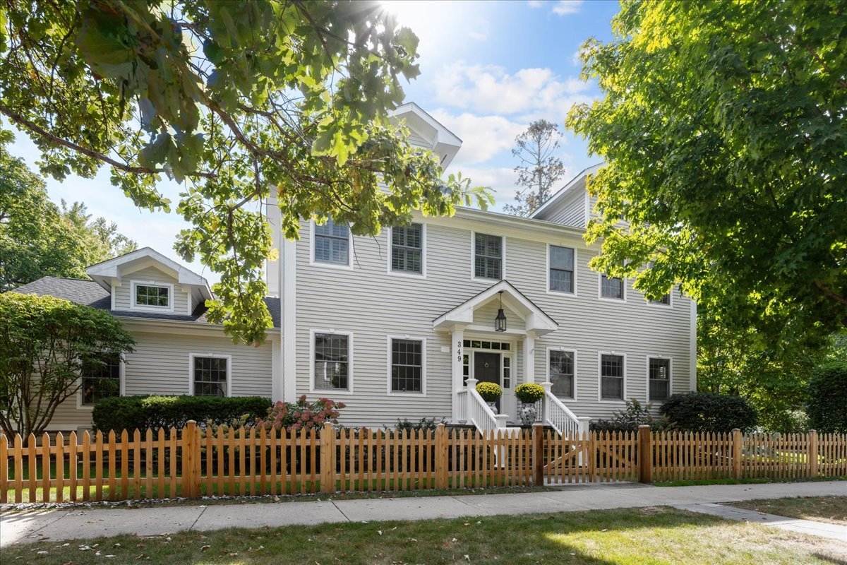 Amazing East Wilmette colonial (2004) on a corner lot with picket fence and pretty garden. Blue-stone pavers and steps lead to a bright foyer and sunny, open first floor. The eat-in kitchen features a large island and opens to a family room with custom built-ins; separate living and dining rooms provide excellent flow for entertaining. The second floor hosts a luxurious master suite with tray ceiling, newly remodeled bath (separate shower, dual sinks, soaker tub) and his-and-hers closets. Three additional bedrooms (vaulted ceilings), two more bathrooms and a convenient 2nd-floor laundry complete the upper level. The lower level boasts tall ceilings, a large recreation room with fireplace, a fifth bedroom, full bath and a flexible bonus room ideal for a gym, office or storage. Practical first-floor mudroom and half bath off the 2 car attached garage, plus direct access from the kitchen to the outdoor patio and yard. Full house generator. High-quality finishes throughout and many recent updates-move right in!