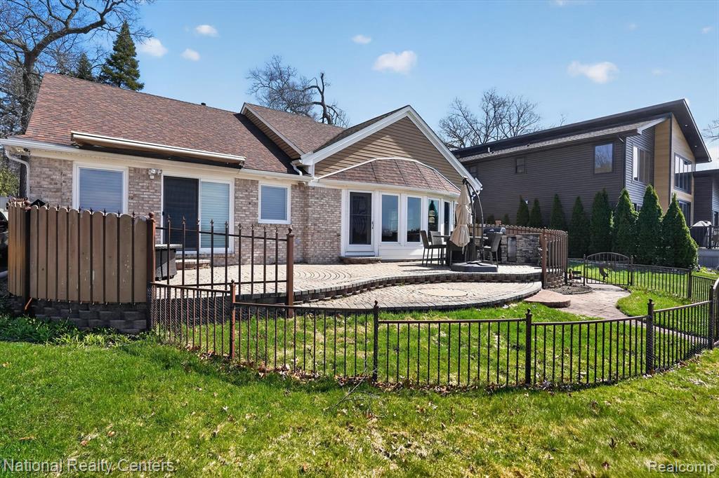 Stunning Lakefront Ranch on Lake Chemung — Sandy Waterfront & Spectacular SunsetsWelcome to your perfect lakefront retreat on the clear, sandy-bottom of Lake Chemung. This beautifully maintained 3-bedroom, 2-bath ranch offers breathtaking lake views from the moment you step inside. The updated kitchen opens seamlessly to a vaulted great room with expansive windows, filling the home with natural light and showcasing stunning water views.The primary suite features a private full bathroom, while the additional bedrooms provide comfortable space for family or guests. The kitchen is equipped with granite countertops, updated cabinetry, stainless steel appliances, and a reverse osmosis water system, making it ideal for both everyday living and lakeside entertaining. Enjoy the comfort of heated tile floors and peace of mind with a new tankless water heater (2024).Step outside to a private backyard oasis featuring brick paver decking, an outdoor kitchen, and a retractable awning—perfect for summer gatherings. The backyard also includes a small fenced area ideal for kids or pets, an outdoor camera security system, and sprinklers fed directly by lake water. An additional storage shed provides convenient space for lake toys, tools, and seasonal items.You’ll also appreciate the abundant parking, including a 2.5-car garage plus extra parking spaces for guests, trailers, or lake toys.With gorgeous sunsets, peaceful surroundings, and clean sandy water right outside your door, this exceptional home offers lake living at its absolute best.