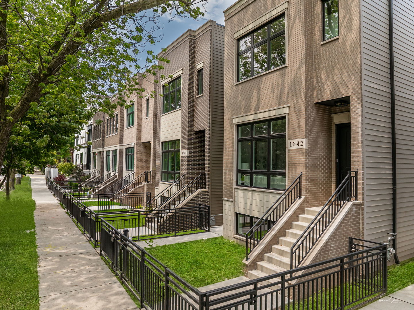 Luxury Living in the Heart of the City: Only 4 Homes Left at the Wolfram Collection. This home has been completed and is ready to move in! Wolfram Collection presents an exclusive opportunity to own a stunning, newly built single-family home that masterfully combines modern luxury, functional design, and urban convenience. With only 4 homes remaining, this boutique development is ideal for discerning buyers looking for both comfort and sophistication in one of the city's most sought-after neighborhoods. Each home at the Wolfram Collection is thoughtfully crafted to provide spacious, light-filled interiors and high-end finishes throughout. The featured residence offers 4,041 square feet of living space, with 5 bedrooms and 4.5 bathrooms, including 3 ensuite bedrooms on the second floor - a rare and highly desirable layout for families. From the moment you step into the sun-drenched formal living room, you'll notice the attention to detail. Oversized windows flood the space with natural light, while high ceilings add volume and presence throughout the home. A formal dining area connects seamlessly to a butler's pantry, creating an ideal setting for entertaining guests or enjoying intimate family meals. At the heart of the home is a chef-inspired kitchen, complete with Thermador appliances, a Sharp drawer microwave, abundant cabinet space, and double-stacked cabinetry for maximum storage. The adjacent family room boasts a contemporary coffered ceiling, offering a warm and inviting area to gather, unwind, and entertain. The luxurious primary suite is designed to impress. Featuring his and hers walk-in closets, an oversized shower, free-standing soaking tub, double vanities, and heated tile floors, it's a true retreat within the home. The second floor also includes a full laundry room with custom cabinetry and utility sink, providing both comfort and convenience. The finished lower level extends the home's versatility, offering a large recreation room with wet bar, 2 more bedrooms, an additional full bath, and ample storage space. Whether used as a guest suite, office, or home gym, this level ensures there's room for everyone and everything. Built with brick and Hardie board siding, these homes are designed to last. A 2-car detached garage comes finished with drywall and is EV charger-ready, with a deck above the garage offering additional outdoor living space. The fenced backyard is perfect for pets, gardening, or playtime. Wolfram Collection is perfectly situated just minutes from shopping, dining, and major transit routes, the Wolfram Collection is also steps from Chi Che Wang Park, providing green space for outdoor activities. With everything at your doorstep, you'll enjoy the perfect balance of city excitement and residential calm. Only Four Homes Remain - Schedule Your Private Tour Today. Whether you're upsizing, relocating, or simply looking for a home that offers the best of city living, the Wolfram Collection delivers unmatched quality, convenience, and style. These homes are move-in ready, offering a rare opportunity to secure new construction in a prime Chicago neighborhood.