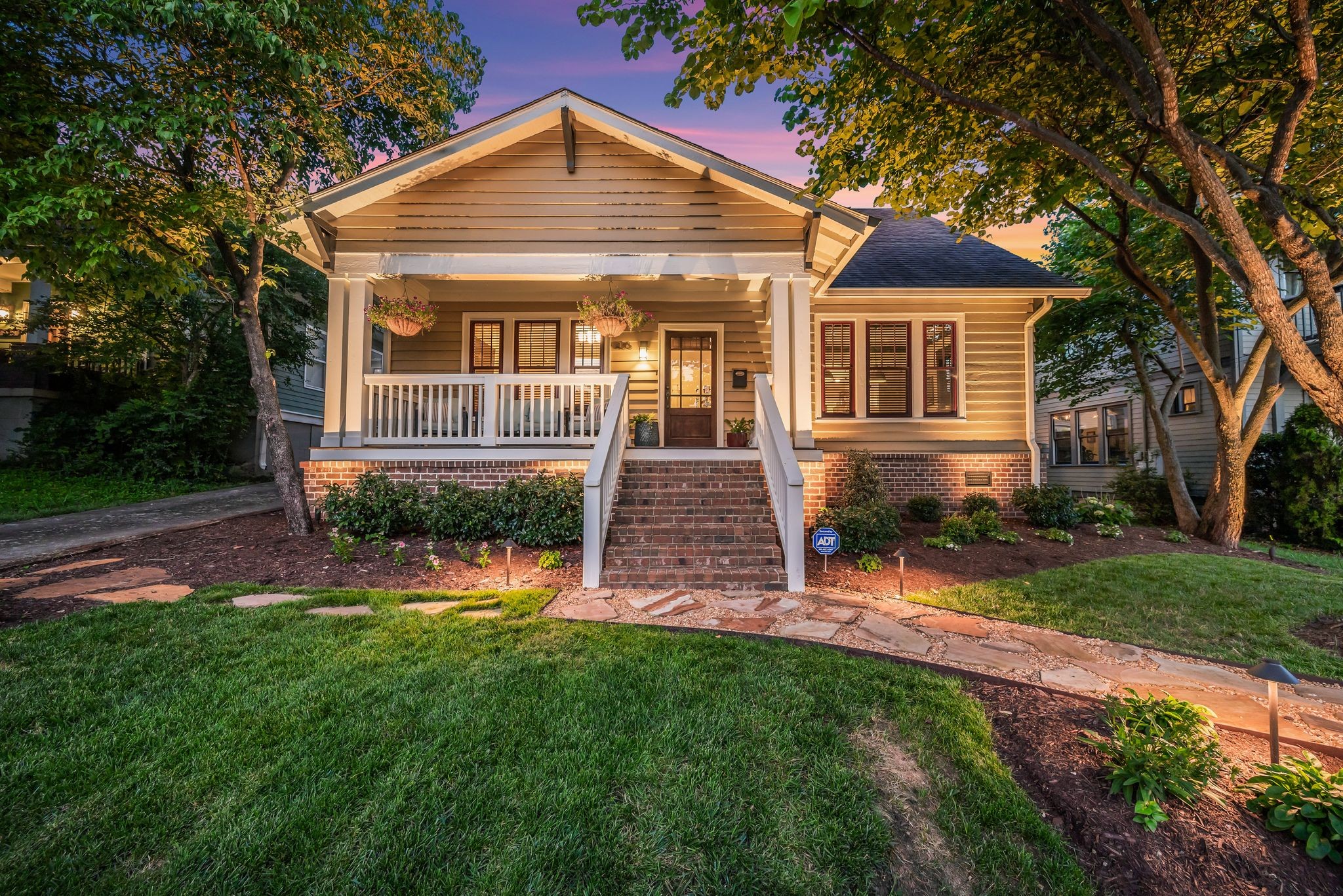 This pristine historic home in Lockeland Spring has been lovingly restored and meticulously maintained offering the best of both worlds. The main house features a primary suite with private bath and a walk-in closet. The second floor offers 2 bedrooms, a bathroom, playroom/office and a bonus room. Out back, you'll find a fully fenced back yard with an amazing deck and beautiful landscaping. There is a 2 car detached garage with double garage doors that open from either the driveway or the alley. The Dadu above has a laundry room and full bath that can be used for guests, an office or for extra income potential. The property also has a driveway with an electronic gate. Original features include 10 foot ceilings, hardwood floors, millwork and doors. Recent improvements include new custom windows and exterior painted in March, 2020; water heater and whole house water filtration system in Jan, 2023; All new deck, exterior lighting and fire table w/gas line in April, 2024.