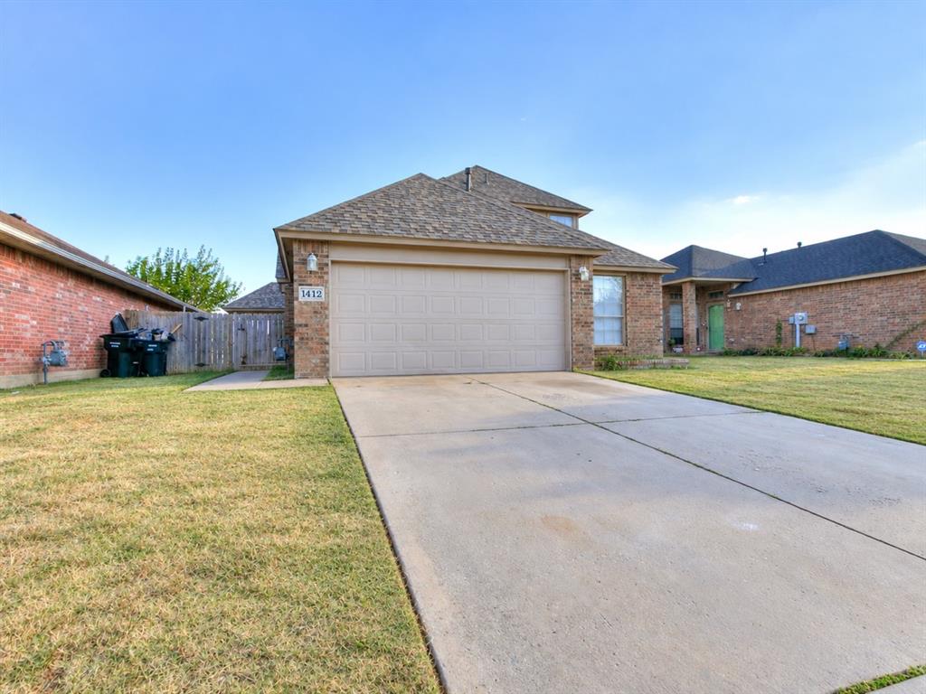 Move-in-ready one-story 2003 brick home in Moore's Southwinds addition. 4 bedrooms, 2 full baths plus half bath, fireplace, central heat/air. Primary suite on main floor; Half bath for guest near living room,  two bedrooms up with full hall bath between. Attached two-car garage. Minutes from I-35 with quick access to Moore and south OKC shopping and dining. Vacant and easy to show.