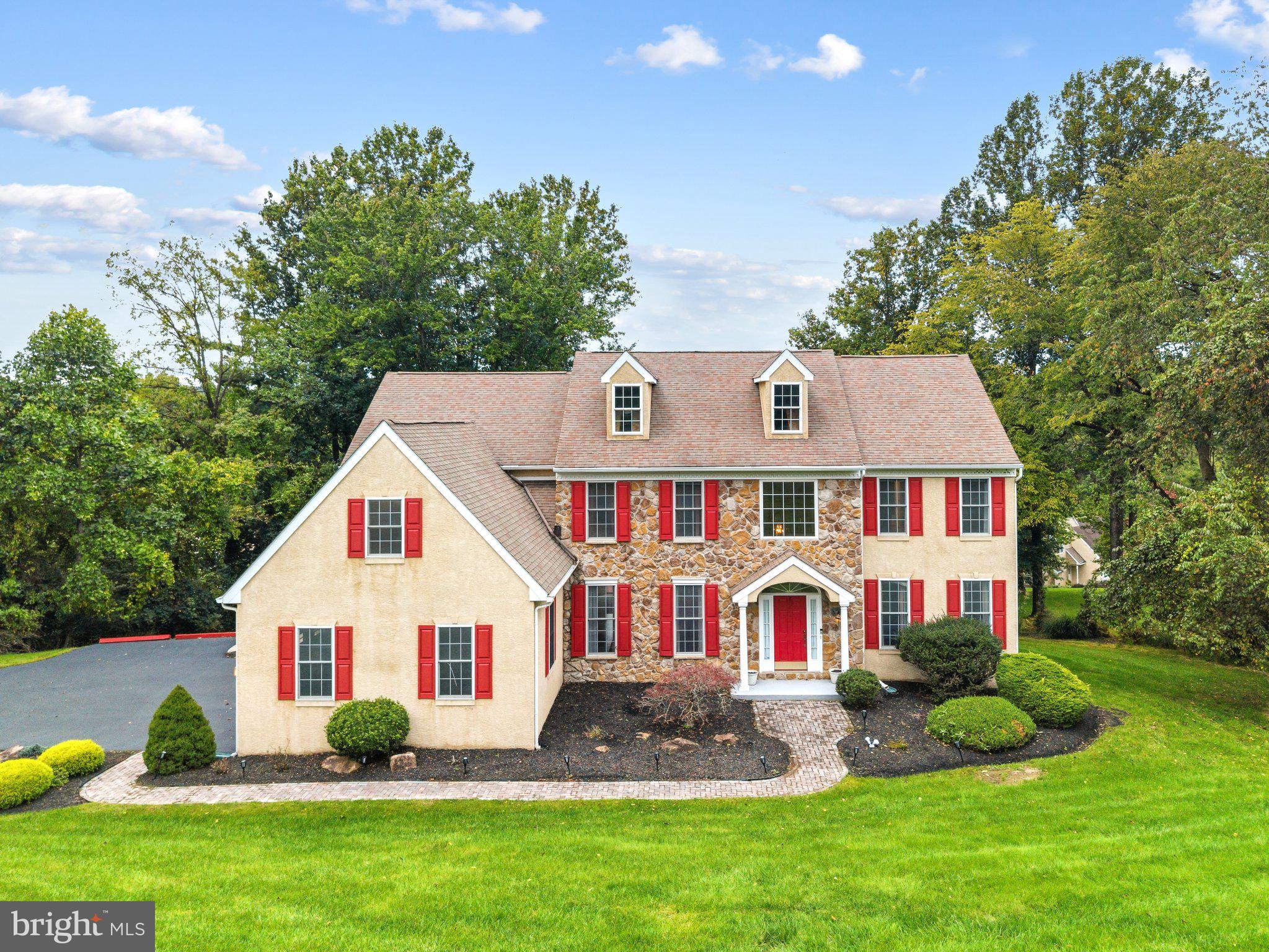 An expansive, open layout with 5000+SF of finished living space in a peaceful neighborhood setting in Uwchlan Hunt, within the award-winning Downingtown School District. This 4-bedroom, 4.5-bath home features a 3 car garage parking and room to entertain indoors and out.A two-story foyer introduces the main level, where hardwood floors and detailed millwork complement spacious living, dining rooms and a dedicated office. The kitchen features granite countertops, a center island and an eat-in area opening to the elevated deck. The adjoining family room impresses with a vaulted ceiling and floor-to-ceiling stone gas fireplace. A separate laundry room adds everyday convenience.Upstairs, the expansive primary suite includes a tray ceiling, a large separate sitting room and a private bath with a jetted tub and luxurious shower. Two additional bedrooms share a Jack-and-Jill bath, while the fourth bedroom is served by a full hall bath. Front and rear staircases provide easy access between levels.The finished daylight walkout lower level is designed for entertaining, with a large wet bar, media area and full bath. French doors open to a beautiful paver patio, extending the living space outdoors with mature landscaping and natural surroundings creating a peaceful backdrop for relaxing on the deck or entertaining on the patio.A broad, lawn area, three-car side-entry garage and whole-house generator complete the property with newer HVAC and roof. A compelling opportunity to enjoy space and privacy at a competitive price for the neighborhood in Downingtown schools.