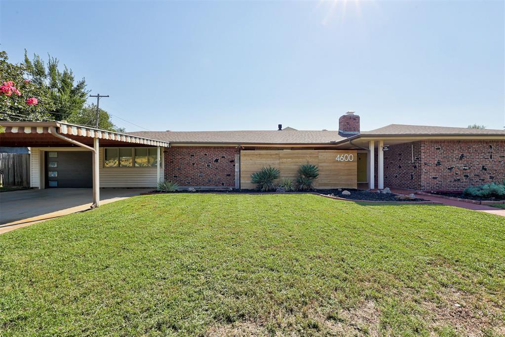 Mid-century Marvel in Mayfair Heights! Just seconds away from coffee, dining + shopping on N May Avenue, this charming 3 bed 2 bath home has ALL of the vibes, and a kitchen that will have you entertaining all year round. We’re talking sports, holidays, baby showers, wedding showers, Mahjong nights… the list goes on. Upon entry, you’re greeted with original brick flooring and sunshine! This entertainers home has a spacious living room with a cozy fireplace, and the perfect nook to setup your home office. Beyond the living area is the heart of the home… the thoughtfully updated kitchen. Imagine all of the cookie decorating on this island around the holiday season! Kitchen dining with gorgeous lighting detail. The north wing of the home has a full bath and bedroom perfect for guests or a second living space. The south wing of the home with two bold bedrooms, and hall bathroom with double sinks and original cast iron tub! Gorgeous wood flooring throughout, and natural lighting like you've never experienced before. And last but certainly not least, this covered back patio was MADE for happy hour, or smore's at the fire pit! Stop by this Sunday, September 7th from 2-4pm to see for yourself!