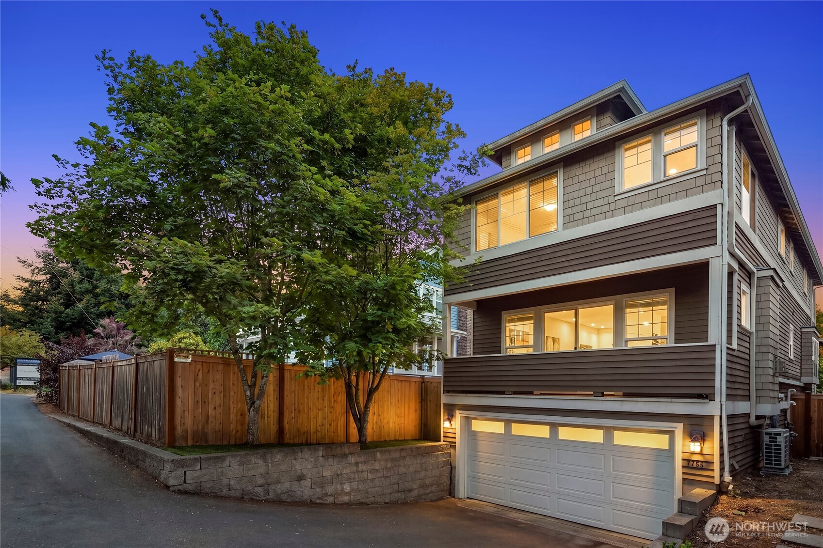 **Seller to credit Buyer $30,000.00 at Closing for interest rate buydown as low as 5.25% with preferred lender** Welcome to Wedgwood, where you come for the Craftsman charm & stay for the coffee, pastries, & community. This stunning home delivers exceptional flow w/ a wide-open living & dining room anchored by a cozy gas fireplace. A chef’s kitchen w/ gas cooking connects seamlessly to the charming family room & sunny kitchen nook. Upstairs, 3 spacious bedrooms feature vaulted ceilings & dormered windows, including a beautifully remodeled primary ensuite. The daylight lower level adds flexibility with a massive bedroom and full bath - perfect for recreation, guests, MIL suite, or multigenerational living. Natural light shines throughout, while a newer heat pump provides energy efficient heat & A/C. Whole-house surge protection plus GFCI/AFCI upgrades add extra peace of mind. Outside, the fully fenced yard (brand-new fencing!) & easy-care turf are ready for playtime, your furry friend(s), or both. And then there’s the location. Fresh berries across the street? Check. Grand Central Bakery for lunch? Absolutely. Top Pot donut for “dessert”? Obviously. Groceries? Two blocks. Morning coffee at Café Javasti? Yes, please. Enjoy the rare luxury of having nearly everything you need just a stroll away. Schools & parks moments from your door. Public transit is a breeze. No car required, but you’ll have a spacious 2-car garage w/ alley access. Beautiful, flexible, & impeccably located.