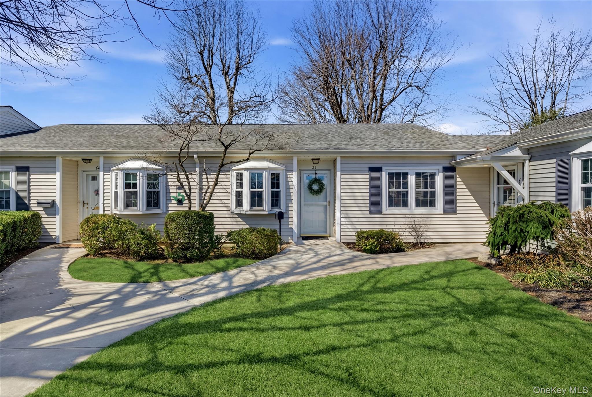 Welcome to this charming two bedroom, two bath condo in the highly sought after Snug Harbor 55+ community.  Featuring a spacious open floor plan, this home is filled with natural light.The kitchen, living and dining areas flow to a private patio - perfect for relaxing among trees and sprawling lawn.  The primary suite offers an ensuite bath with a walk in shower, while the second bedroom is ideal for guests or a home office.Enjoy a perfect blend of comfort and convenience in a serene setting.  Snug Harbor is known for its beautifully landscaped grounds with scenic walkways of lakes, bridges and docking for boating enthusiasts.  Community amenities include a clubhouse with kitchen, in-ground pool, tennis and pickleball courts, and a firepit for gathering with friends.Experience peaceful living in a vibrant, welcoming community.