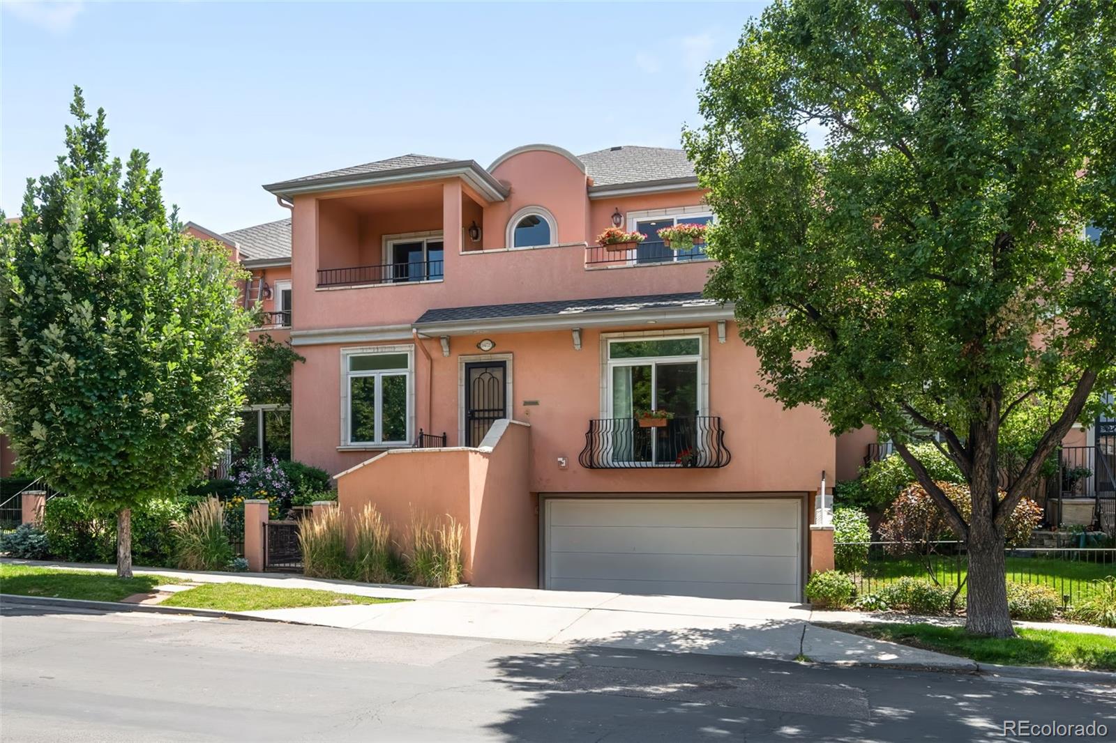 This elegant, spacious townhome is Cherry Creek living at its finest!  Unbeatable location- extremely walkable to the fine dining and luxury shopping Cherry Creek North is renowned for.  The main floor captivates with abundant natural light, custom stained glass windows, high ceilings and a huge open living/kitchen area.  The main floor bedroom features a fireplace and a walk-in closet.  Completing this floor is a bright office and a powder room.  Out back you'll find a cozy patio with an electric awning, perfect for dining al fresco and enjoying the Colorado evenings.   In addition, an elevator operating from the basement to the second floor provides the property with easy accessibility.  Upstairs is a large loft area with built-in bookshelves, two more bedrooms and bathrooms, an office, a wet bar and a balcony stretching the full width of the second floor.  The fully finished basement includes a large rec room, another full bed and bath and two egress windows.  The tandem three-car garage with four large built-in storage cabinets is sure to meet all your storage and parking needs.  With over an unbeatable price per square foot and 3800 finished square feet in a prime location, you'll want to come see this one for yourself!