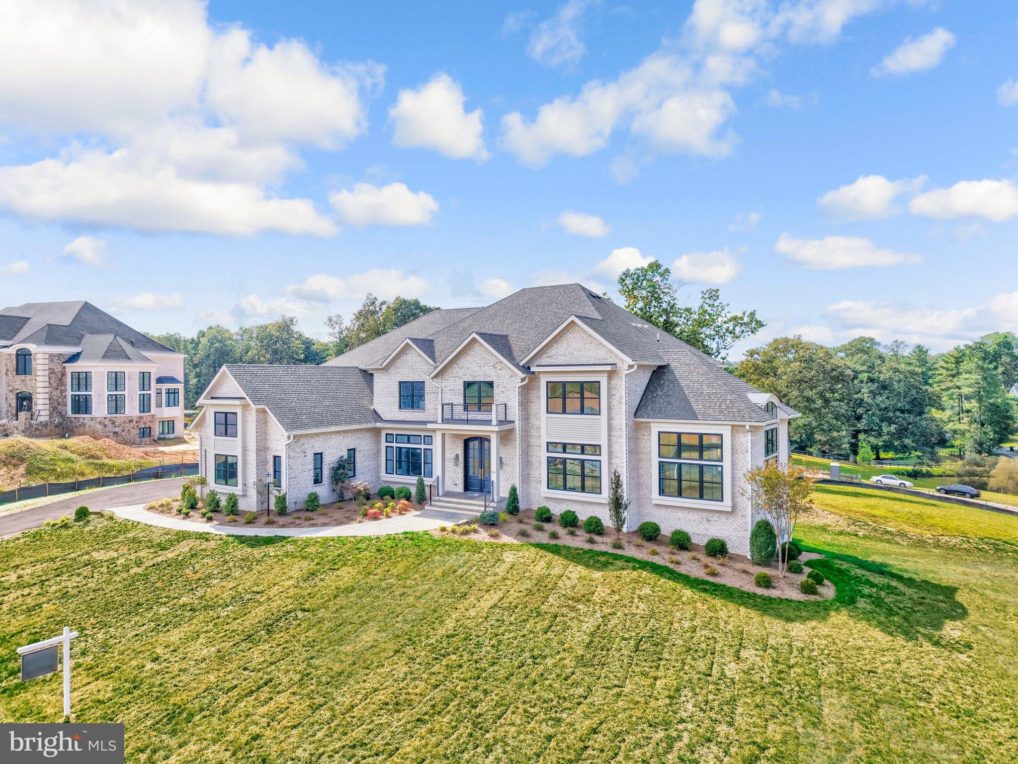 Gulick Group's newest creation at Still Pond ready for summer delivery offers  contemporary flare,  open concept living and designer interior and exterior features superior to most other new homes in the Langley school district.  4-sides brick offering 6 bedrooms and 7.5 bathrooms with oversized brick and black windows, and large deck.  A newly designed "clean contemporary" elevation  gives this home unparalleled street presence.  Expansive professional  kitchen  with large island and oversized walk-in pantry.  Main level fits all of your current and future needs with a main level bedroom with one and a half full bathrooms and 3 floor stacked  elevator closet with shaft for future installation in addition to a  sunlit Sunroom and airy Conservatory.   The upper level boast an expansive owner's suite with outfitted dressing room and His and Hers Full Baths along with  3 additional en-suite bedrooms and an upper level laundry.  The  walk out Lower level is fully finished with a full bar, media and exercise rooms and bedroom. Enjoy all of the perks with this newly developed community which is centrally located to the Potomac River trails  and dining at nearby L' Auberge restaurant.