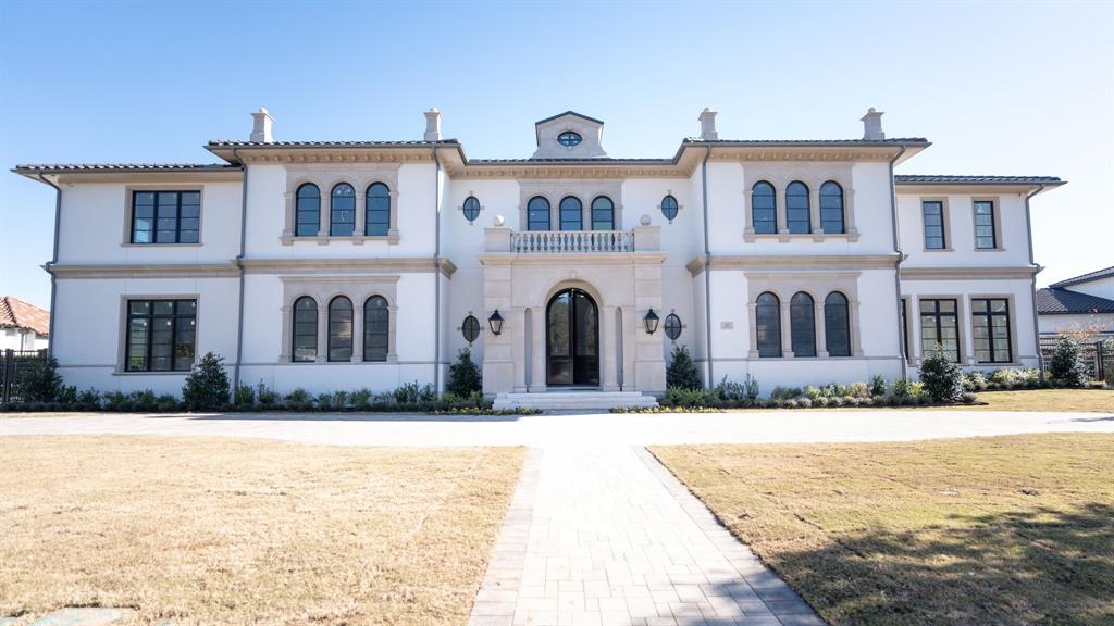 Currently under construction, this extraordinary Neoclassical-inspired estate is poised to become one of North Texas’s most iconic luxury residences. Thoughtfully designed by Lloyd Lumpkins Architects and meticulously built by Sharif-Munir Custom Homes, the property seamlessly blends timeless European elegance with Mediterranean sophistication. Set on a premier lot backing to Hole 3 of the Arnold Palmer Signature Course, the home spans over 13,000 square feet, with an additional 5,000+ square feet in a fully finished basement, thoughtfully crafted for refined living, lavish entertaining, and the most discerning lifestyle. A dramatic entry hall welcomes you into a grand interior anchored by a gallery with groin-vaulted ceilings. Among the home’s planned features are a Gilded Age-inspired sunroom with soaring windows, a private gym that opens to a covered patio with automatic drop-down screens, a full sauna, an oversized game room, and a grand media room pre-wired for speakers. The expansive living spaces are both elegant and comfortable, centered around a chef’s kitchen equipped with top-tier appliances, a secondary spice kitchen, and a spacious butler’s pantry. Designed with flexibility and privacy in mind, the home offers seven bedrooms and eleven bathrooms, including a fully equipped multi-generational suite with a separate entrance. Outdoor living will be nothing short of spectacular, featuring a large covered patio and upper balcony, both with automatic screens, alongside a summer kitchen perfect for year-round enjoyment. A private drive-down ramp leads to a six-car basement garage with a dedicated storage room. The property also includes smart home technology. Located within the exclusive, guard-gated Wimberly Place, Allen’s only neighborhood of its kind. This property doesn’t just offer a place to live, it offers a way to live.