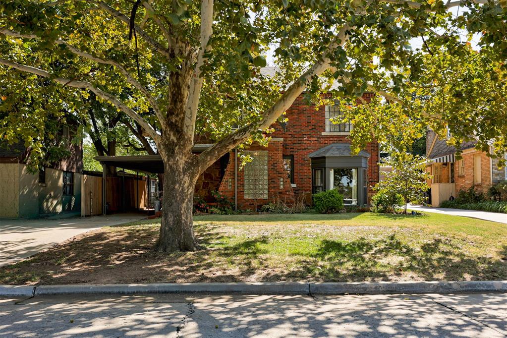 Darling, cozy home in the heart of OKC, a great opportunity in Historic Shepherd District! Mature trees, great curb appeal, covered parking and a welcoming exterior make this home a winner before you've even made it in the door. Historic charm sweeps you away the moment you step inside. This home has been well maintained and thoughtfully updated to keep it's best characteristics on display! The main floor has space for everyone: a cozy den, an open + flowy living room, and a kitchen flanked on either side by dining spaces both formal and informal. Off the back side of the kitchen you'll find an incredibly functional utility space for laundry, storage, exterior access, basement access, and so much more! Kitchen features include newer stainless appliances, granite countertops, and a fresh coat of paint throughout both the kitchen and utility spaces. Don't miss the breakfast nook built-ins, historical charm on full display! Upstairs you'll find three bedrooms and a full bathroom, all flooded with natural light and historic charm. Don't miss the walk-out balcony off the SE corner of the home. The backyard is where this property shines: a comfortable covered patio, which transitions beautifully to a shaded yard and conversation/fire pit area. An entertainers dream! Outdoor storage building provides additional space and peace of mind. All of this, directly across the street from the exceptional Swatek Park, complete with walking trails and great play equipment. This home is just lovely, and even better in person. Come see it yourself!