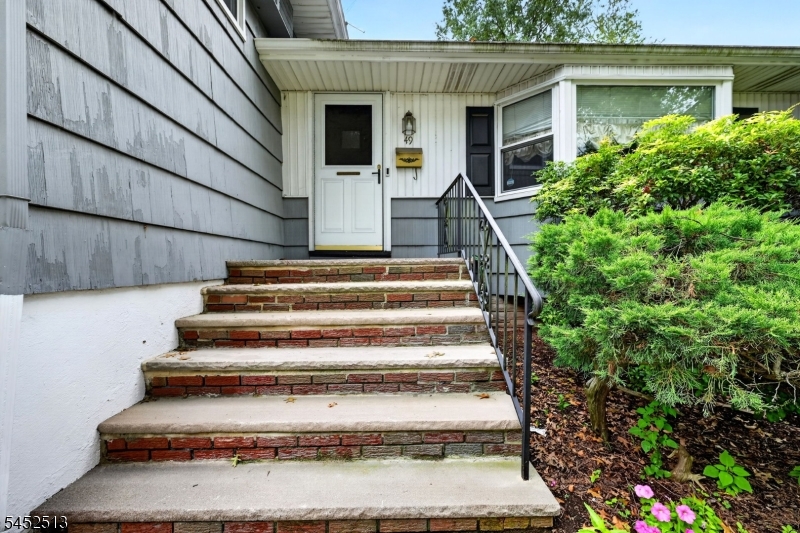 This remarkable property is sure to attract a lot of interest! Nestled in the charming and highly sought-after town of Cranford, this spacious split-level home offers a wonderful opportunity for you to add your personal touch. As you enter, you are greeted by a generous foyer. You'll be drawn in by a beautifully designed eat-in kitchen equipped with a high-end Viking Range and sleek stainless steel finishes, perfect for the culinary enthusiast. Imagine whipping up gourmet meals, baking delightful treats, or enjoying a casual breakfast in this inviting space. The heart of the home features an elegant sunken formal living room and a sophisticated formal dining room, setting the stage for unforgettable gatherings. With four comfortable bedrooms and two and a half well-appointed baths, there's ample space for everyone. Adding to its appeal, this home boasts a large leisure room for versatile relaxation or entertainment, along with an attached garage and a full basement for additional storage or future expansion. Situated on a spacious corner lot, this deluxe property is perfect for outdoor activities or landscaping projects. Don't miss your chance to see this gem early. With a little vision and some TLC, this home can become the dream residence you've always wanted!