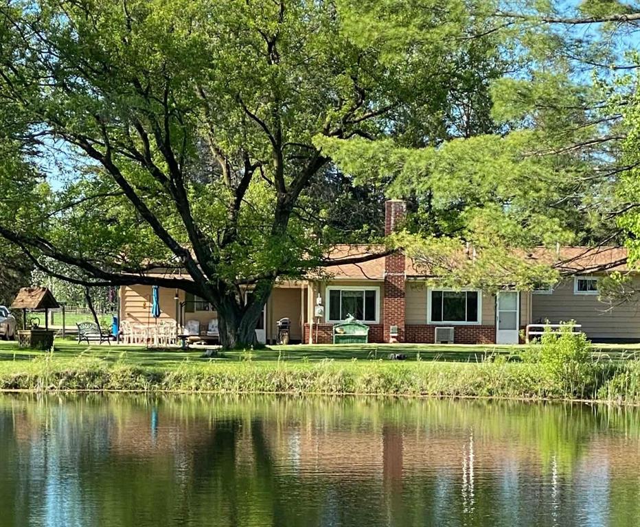 Welcome to your private northern retreat, where 40 acres of well maintained land offers the perfect balance of comfort, recreation, and seclusion. This charming 3-bedroom, 2.5-bath home offers a cozy and functional layout with timeless character, providing a wonderful opportunity to make it your own. Step outside and youll find an outdoor enthusiasts dream, complete with groomed trails that wind through the property, ideal for hiking, riding, or peaceful exploration in every season. Established hunting blinds are already in place, and the land is rich with wildlife, creating amazing opportunities for both sport and observation. A beautiful pond adds a serene focal point, enhancing the propertys natural beauty while attracting birds and game alike. The 30x40 pole barn, featuring a durable concrete floor and full electrical service, provides plenty of space for equipment, storage, or workshop needs. Whether you're searching for a year-round home or a secluded getaway, this property offers unmatched tranquility and versatility in a truly scenic setting.