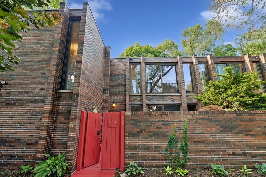 Welcome home to this special opportunity: this rarely available Mid-Century brick townhome is on a beautiful tree-filled location in the heart of Hyde Park, steps from Hyde Park Produce and UChicago Campus. The Skylights throughout the home offer wonderful light cascading in daily with the floor-to-ceiling balcony doors with that mid-century timeless architecture. The home features a wood burning fireplace you can warm up to in the beautiful cozy Chicago winters. All seasons enjoy the lovely the front deck/ meditation garden, and the back entertaining area featuring east facing sun with lush greenery while remaining conveniently close to the kitchen, double-level dining room and living room. This Hyde Park townhome represents an exceptional find, not only for its rarity but also for its superb off-street location, with captivating design and thoughtful features. Enjoy the added luxury of being steps from Lake Michigan, the central Hyde Park retail areas and Hyde Parks nationally recognized cultural institutions, Art galleries, and Museums including The Kenneth C. Griffin Museum of Science of Industry, The Hyde Park Art Center, Court Theater, and The upcoming Obama Presidential Center (2026). This community offers an incredible living experience with lakefront beaches, bike trails, marinas, golf courses, tennis courts, and parks. Transportation is readily accessible with the University of Chicago bus line, Chicago Metra, and CTA nearby. This unique Townhome opportunity in your own tree-lined urban oasis is special. Welcome Home! Move in ready or add your updates as you see fit, the equity in this home will just rise with everything you put in. Note Completely NEW HVAC, (fall 2025). There are no homeowner assessments for this home.