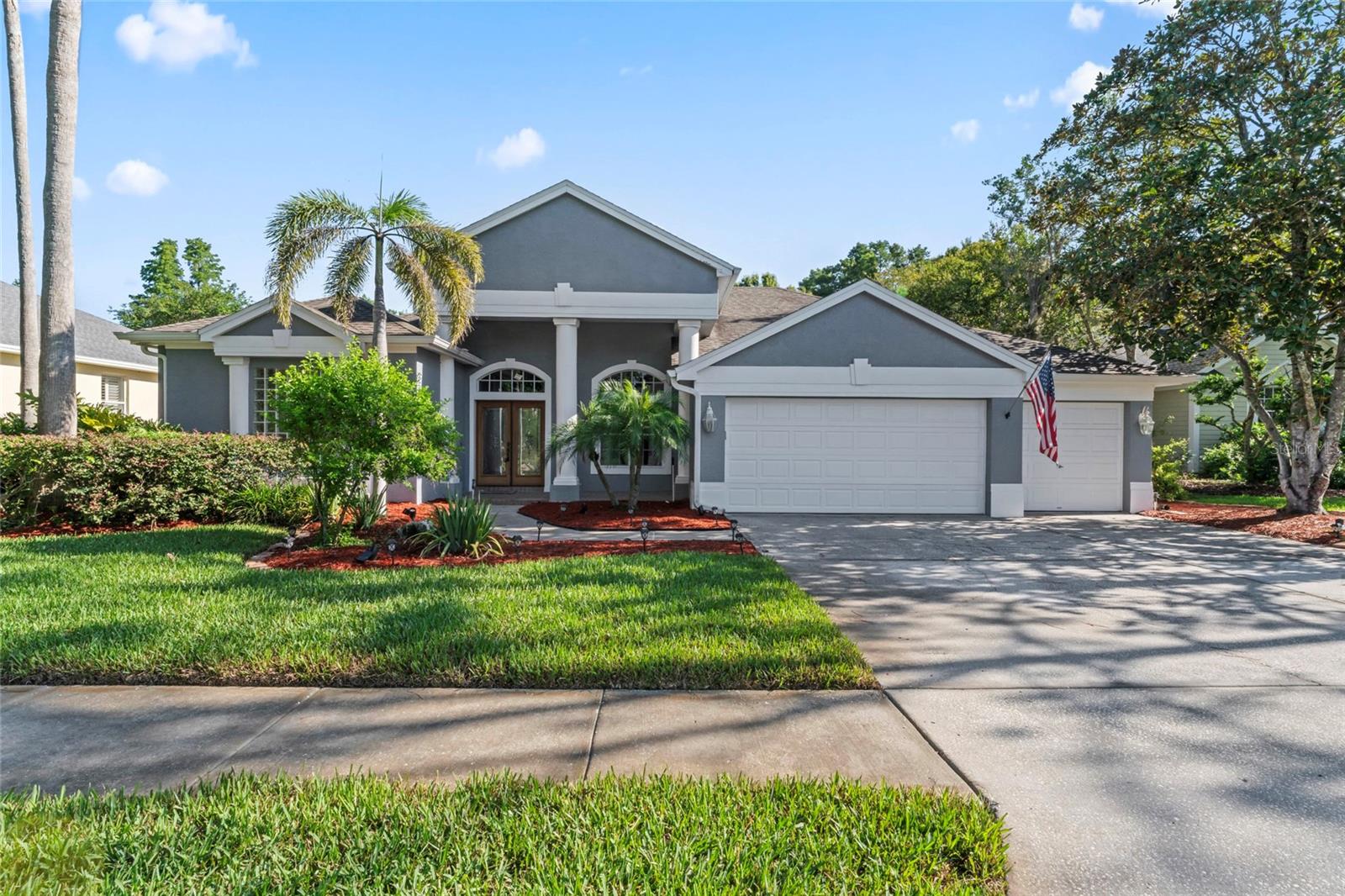 Located in the highly desirable East Lake corridor of Palm Harbor, this exceptional home is being offered for the first time and showcases the perfect blend of comfort, style, and serene natural surroundings.

This stunning 4-bedroom, 3-bath home with a 3-car garage offers 2,531 square feet of beautifully maintained living space. Backing up to the Brooker Creek Preserve and a tranquil pond, the property offers both privacy and peaceful views in one of the area’s most sought-after communities.

Inside, you'll find an open and airy layout with hardwood flooring throughout the family room, living room, and bedrooms. The split-bedroom floor plan ensures privacy, while the spacious design is perfect for everyday living and entertaining.

The gourmet kitchen features granite countertops, solid wood cabinets, stainless steel appliances, a gas range, and a striking glass-to-glass window in the breakfast nook that frames scenic views of the pool and pond.

Retreat to the expansive primary suite, which includes dual walk-in closets, a garden tub, a separate shower, and direct access to the screened lanai. Recent updates include a new roof (2020), new A/C (2023), new exterior paint (2020), and pool resurfacing (2023). The screened pool and spa area is surrounded by elegant travertine pavers—perfect for relaxing or entertaining in your own private oasis.

Enjoy nearby access to John Chesnut Park and Tarpon Lake, plus close proximity to top-rated schools, the airport, beaches, shopping, and dining.

This is Florida living at its finest—don’t miss this rare opportunity in a truly prime location.